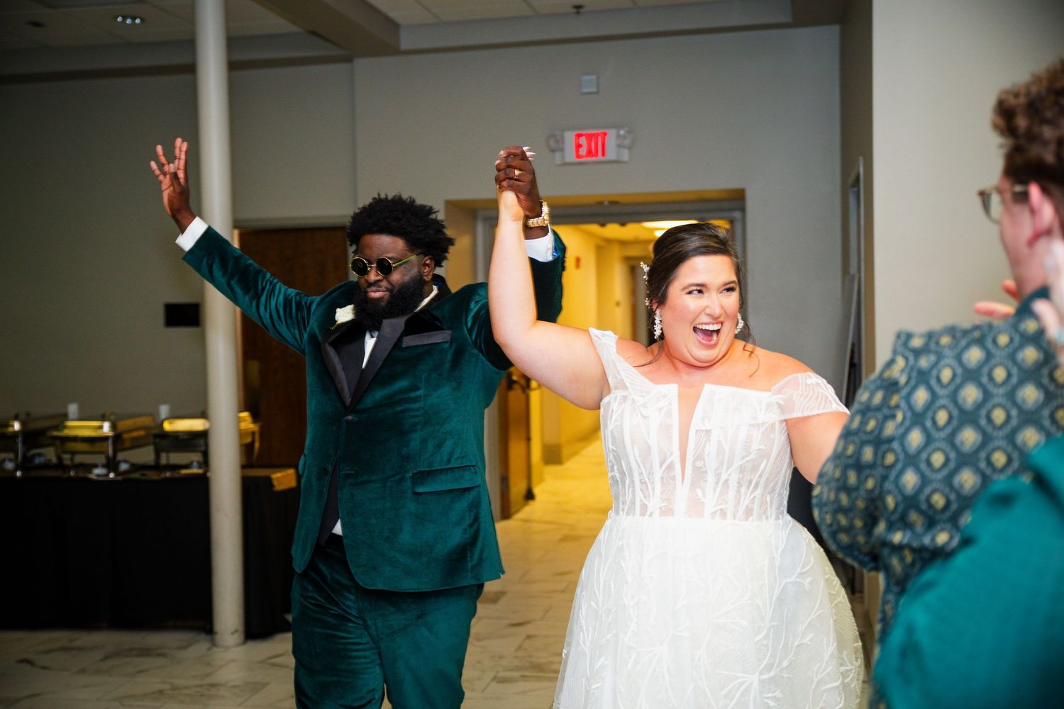 Wedding celebration moments showing joy and laughter in an indoor venue.