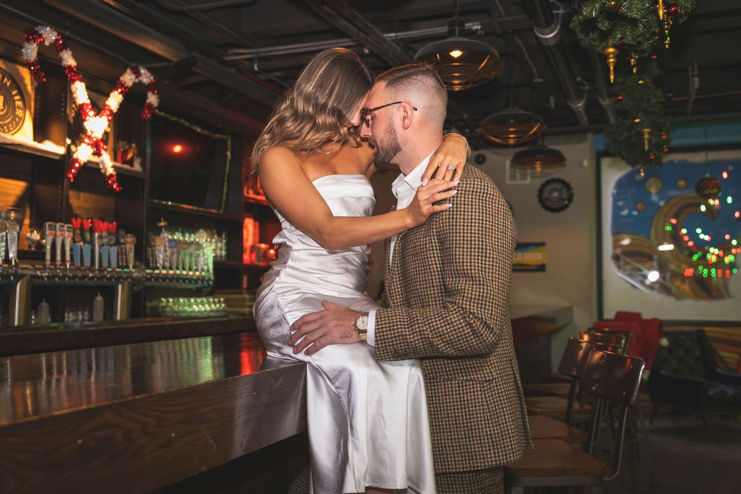 Newlyweds share an intimate moment on the dance floor at their wedding reception.