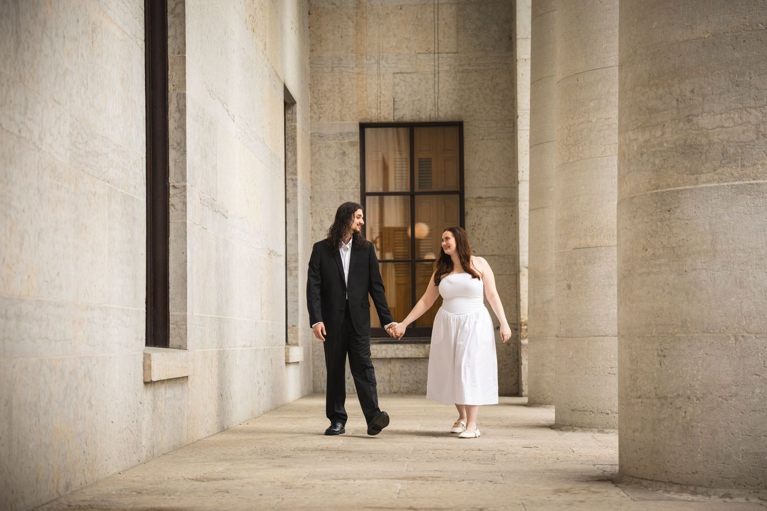 A series of romantic photos captured in a classical colonnade setting.