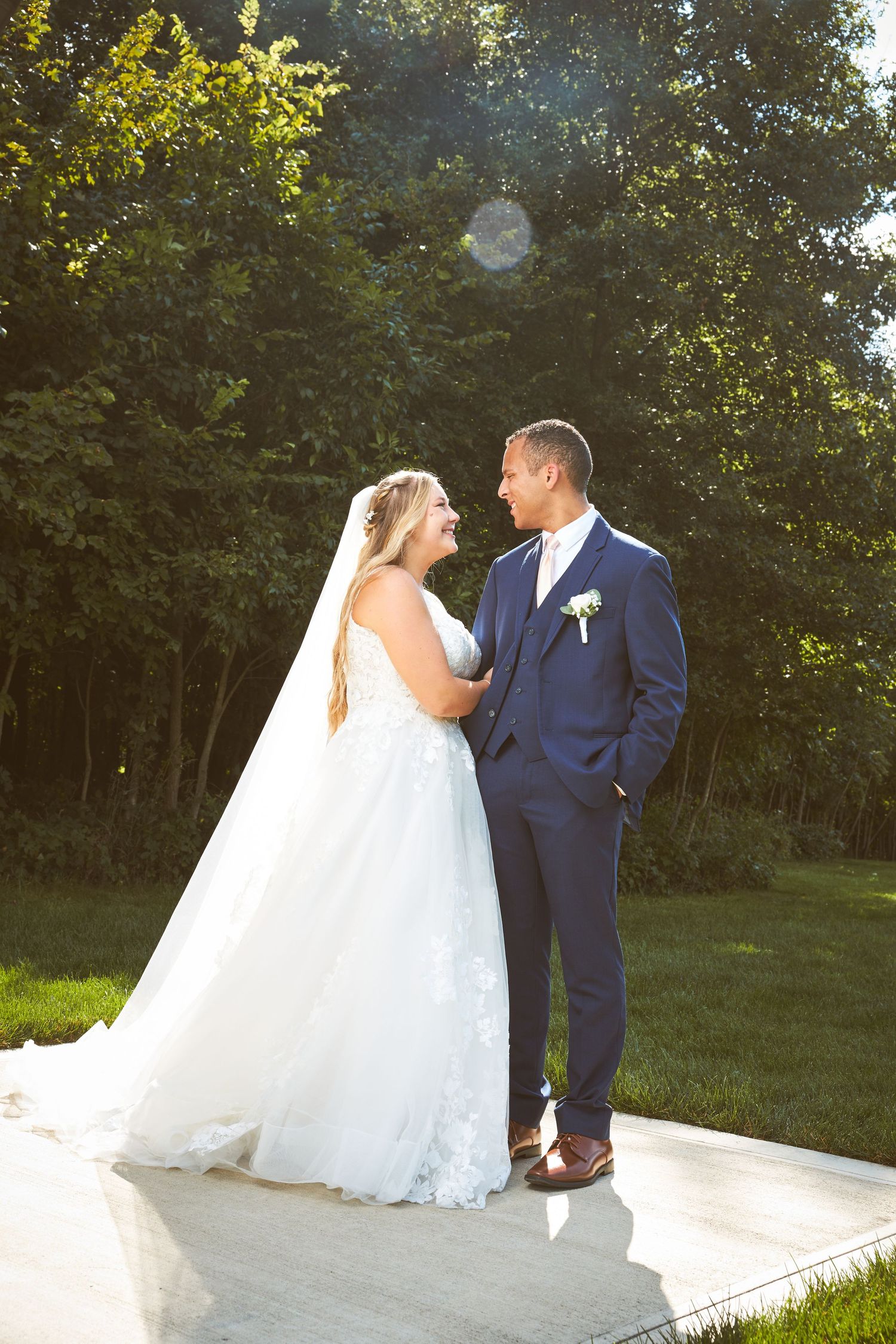 A couple shares a romantic moment on the dance floor during their wedding celebration.