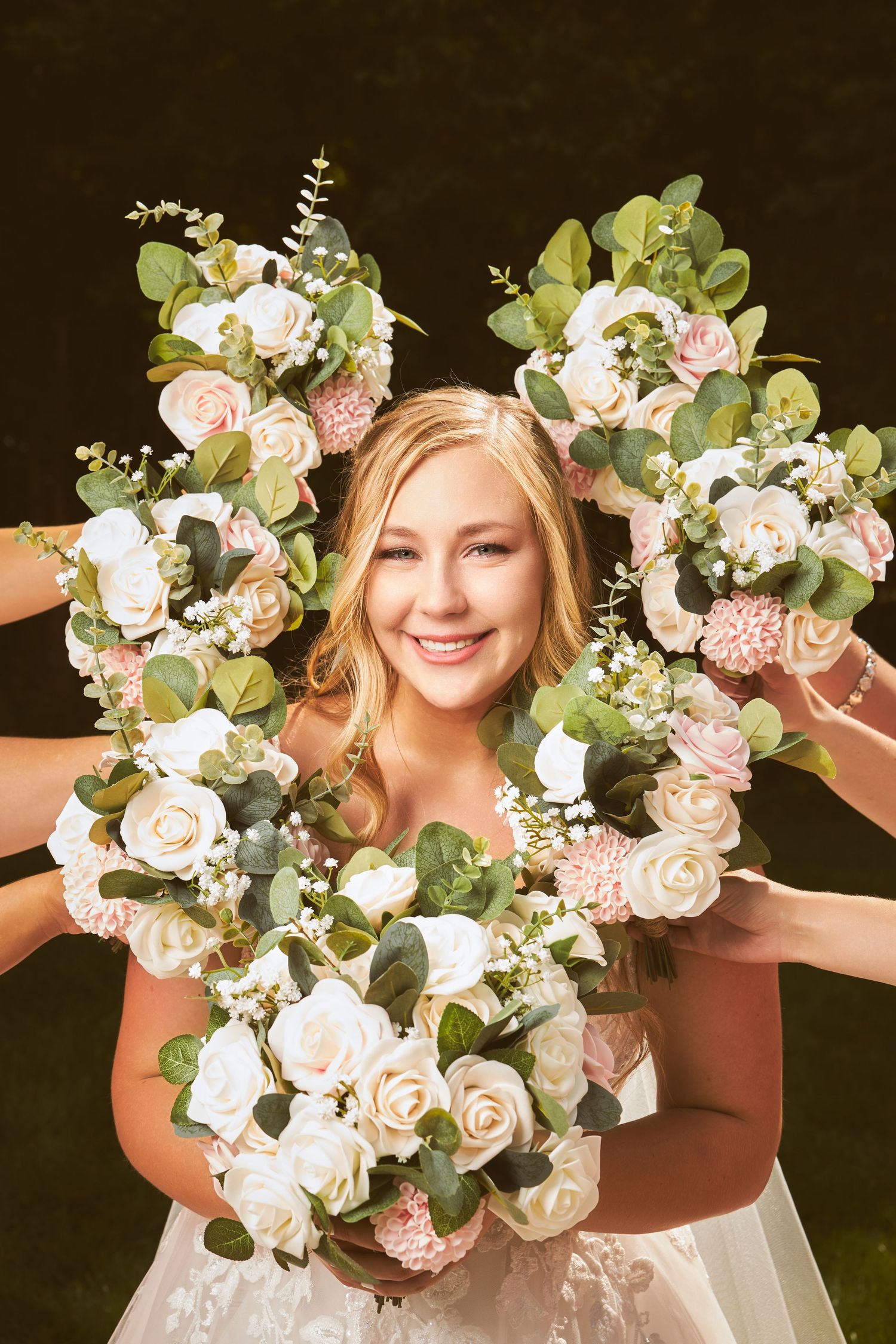 Beautiful floral bouquet with white roses and eucalyptus leaves.