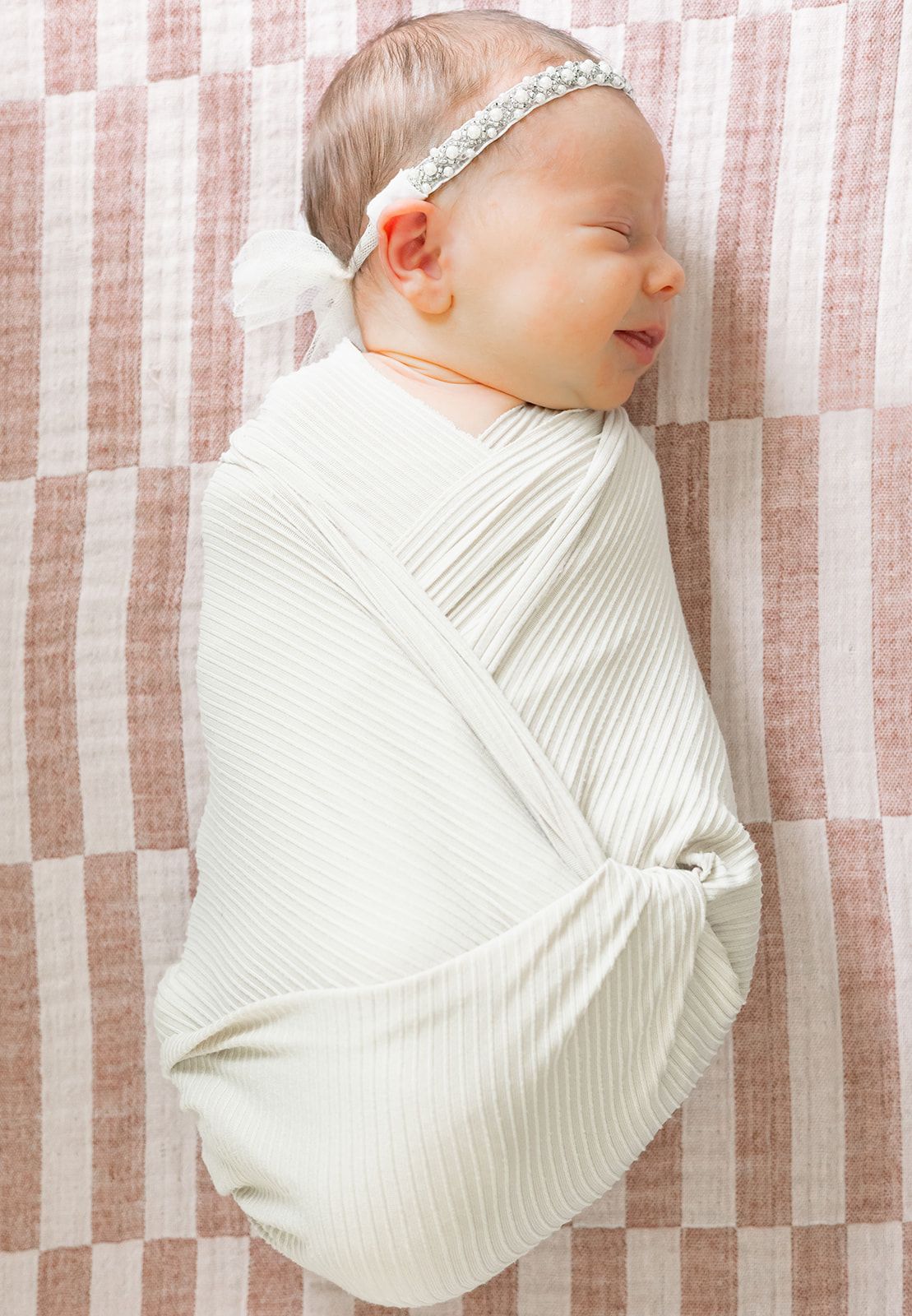 smiling baby girl at fresh 48 session