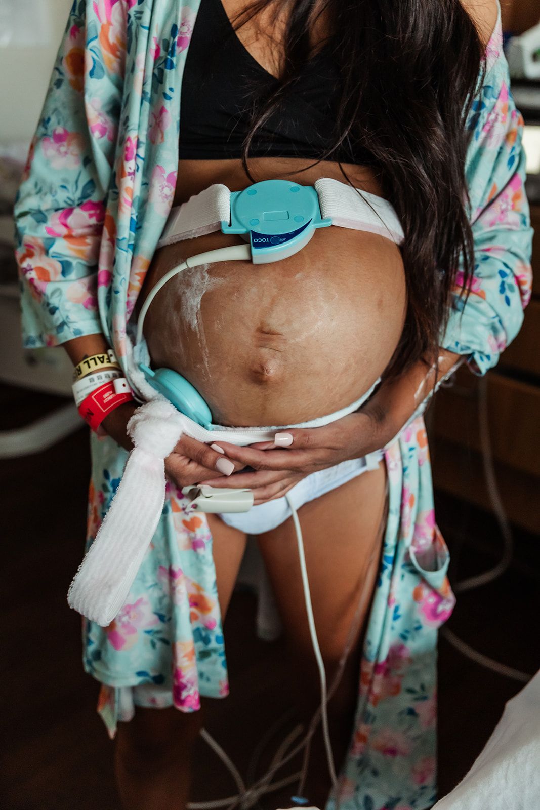 laboring woman being monitored with toco bands at midland memorial hospital
