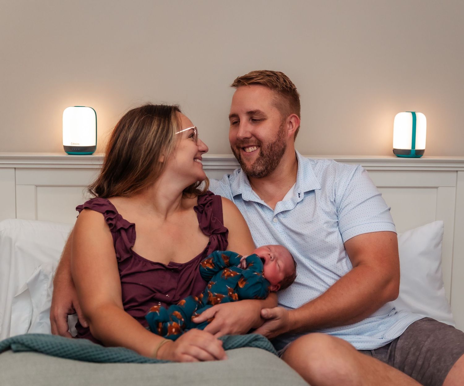 happy new parents smiling at the birth center of midland