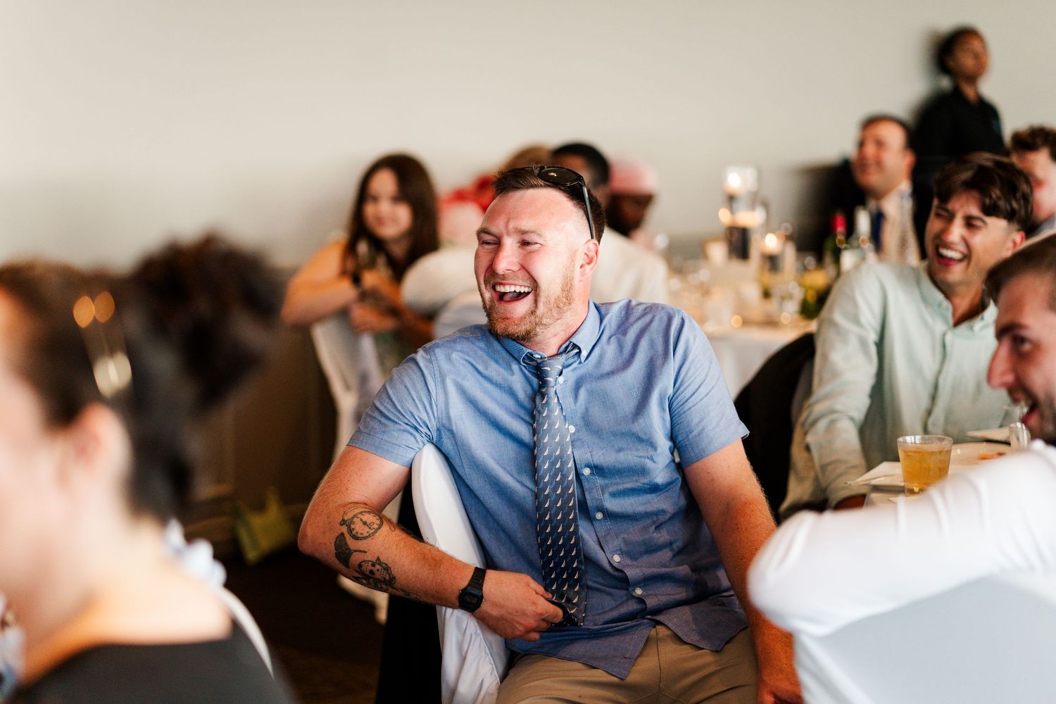 Wedding guests laughing and enjoying themselves during the reception celebration.
Wedding in Niagara.