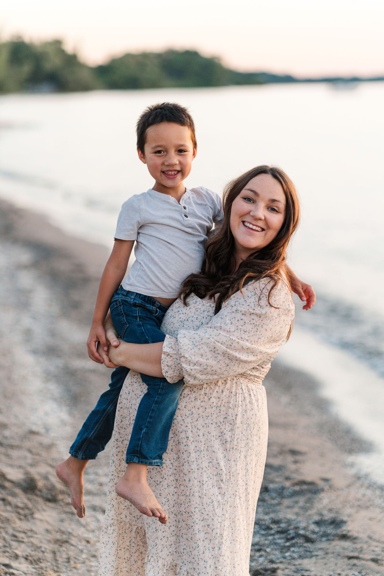 Family shares joyful moments together during a casual beach photoshoot at sunset.
Niagara family photos.