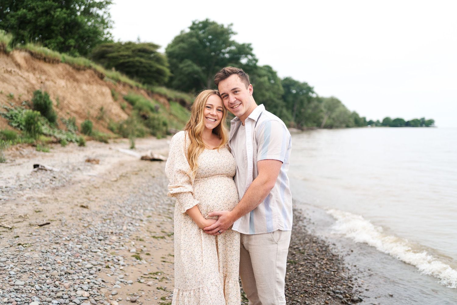 Romantic beach photoshoot at sunset with rocky shoreline and natural coastal scenery.
Niagara Maternity photos.