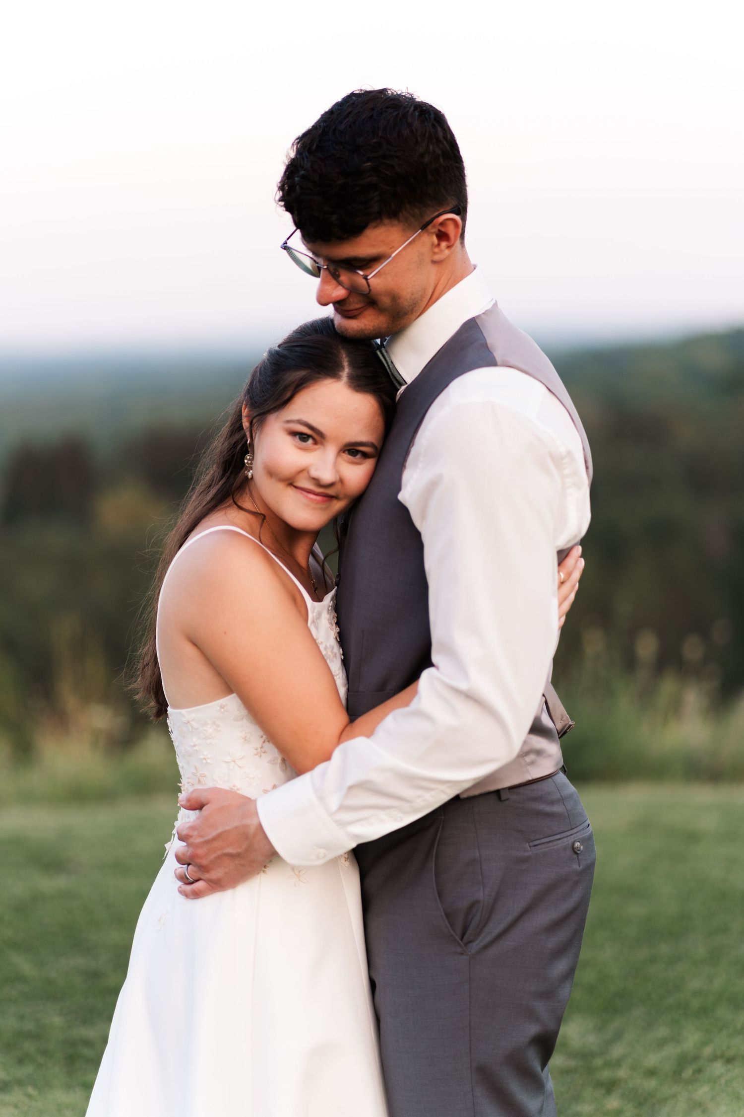 Intimate wedding couple moment captured in outdoor setting.
Niagara Wedding photography.