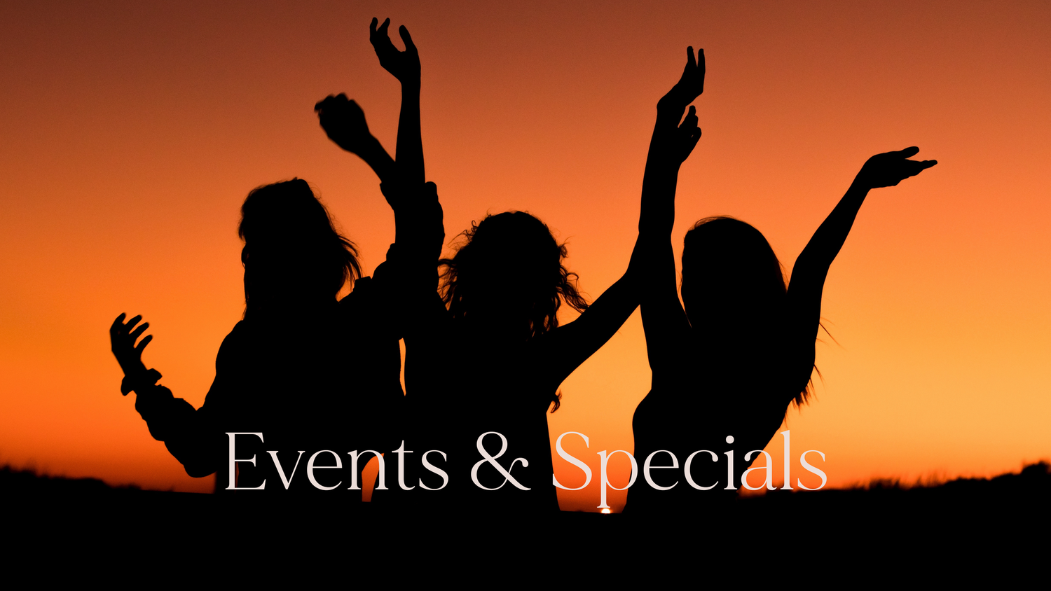 Silhouettes of three women dancing at sunset with arms raised, promoting Events & Specials against an orange sky.