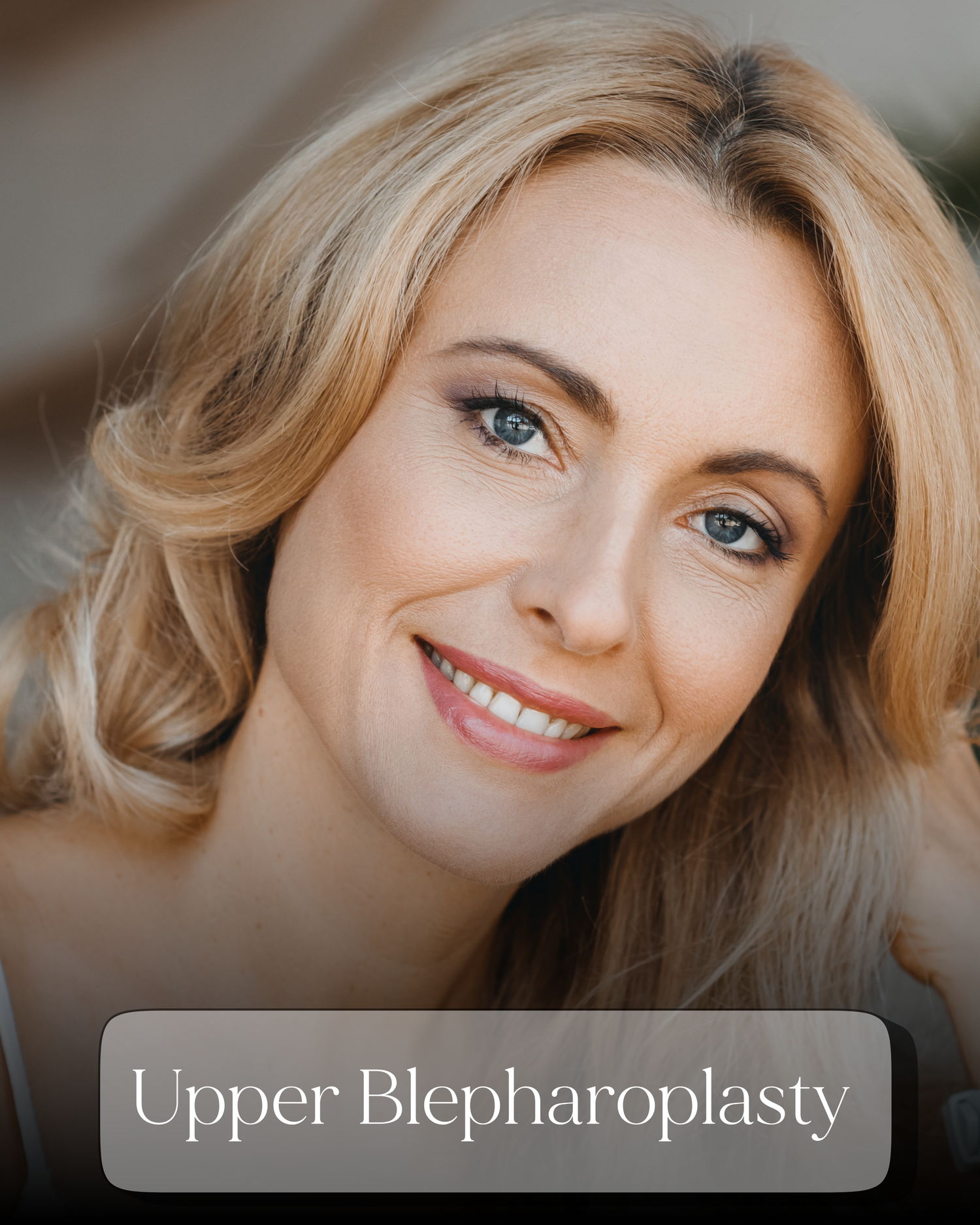 Blonde woman with bright eyes and smooth skin showcasing Upper Blepharoplasty results at Glow Med Spa.