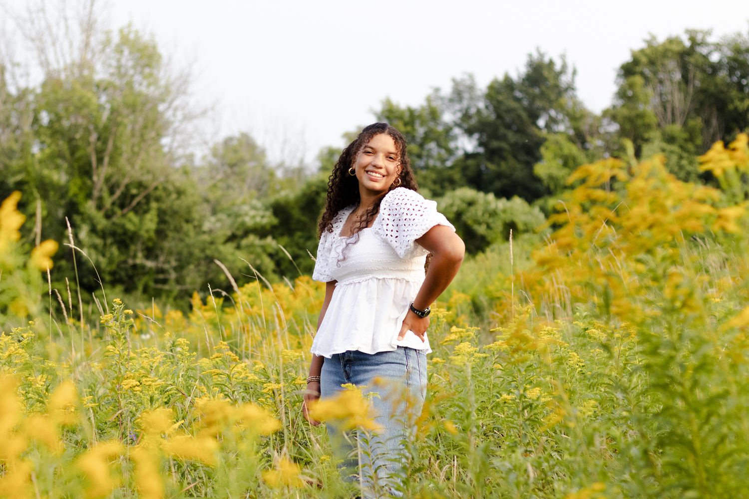 Outdoor senior portrait in field