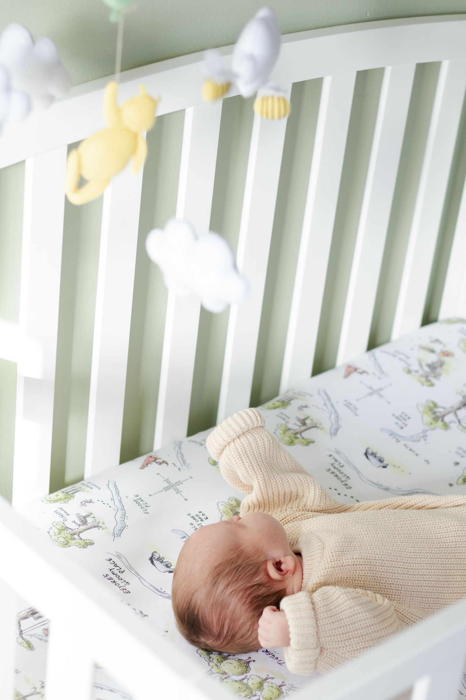 Image of newborn in crib