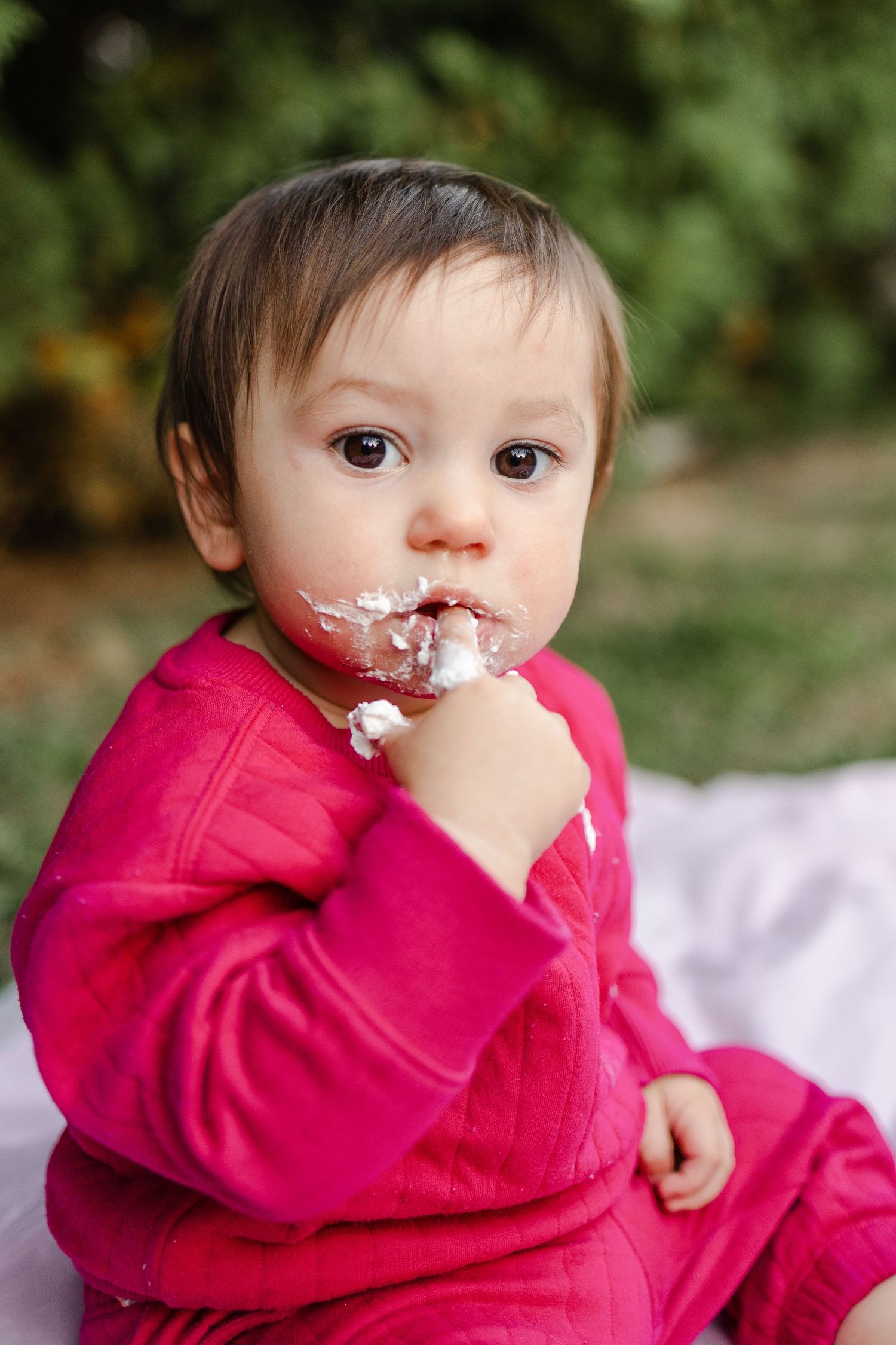 Toddler eating cake
