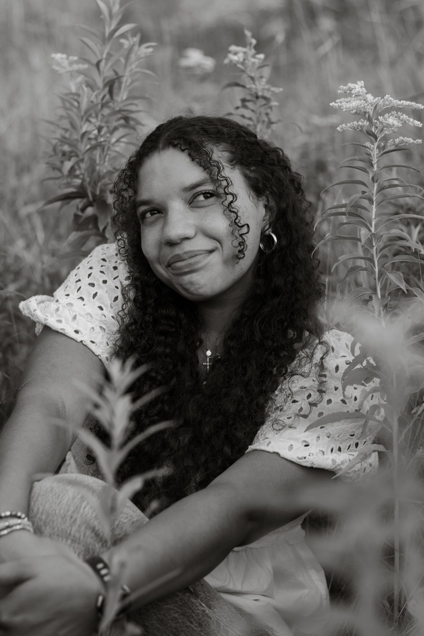 Senior portrait in field black and white