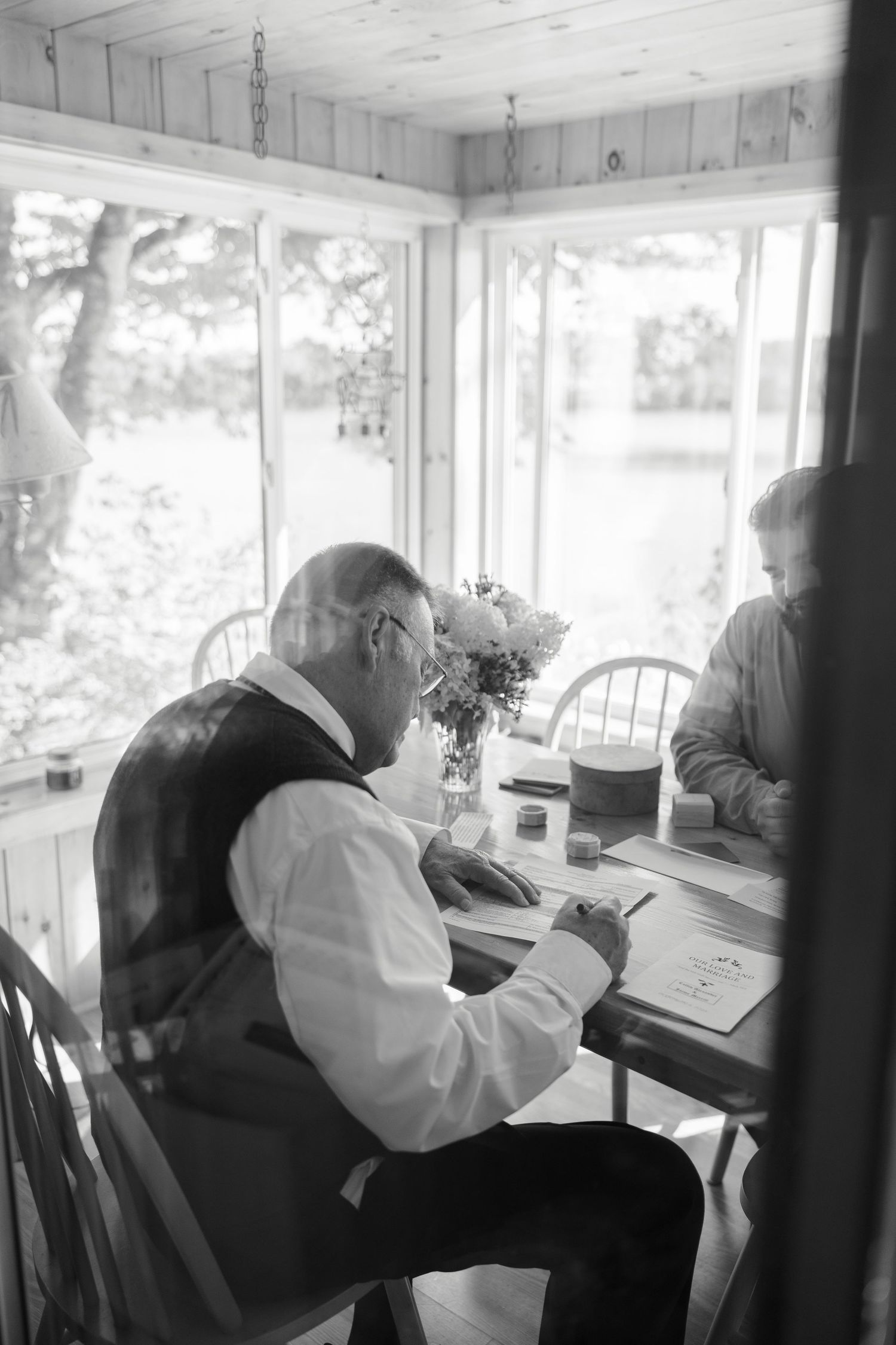 Candid photo of officiant at wedding