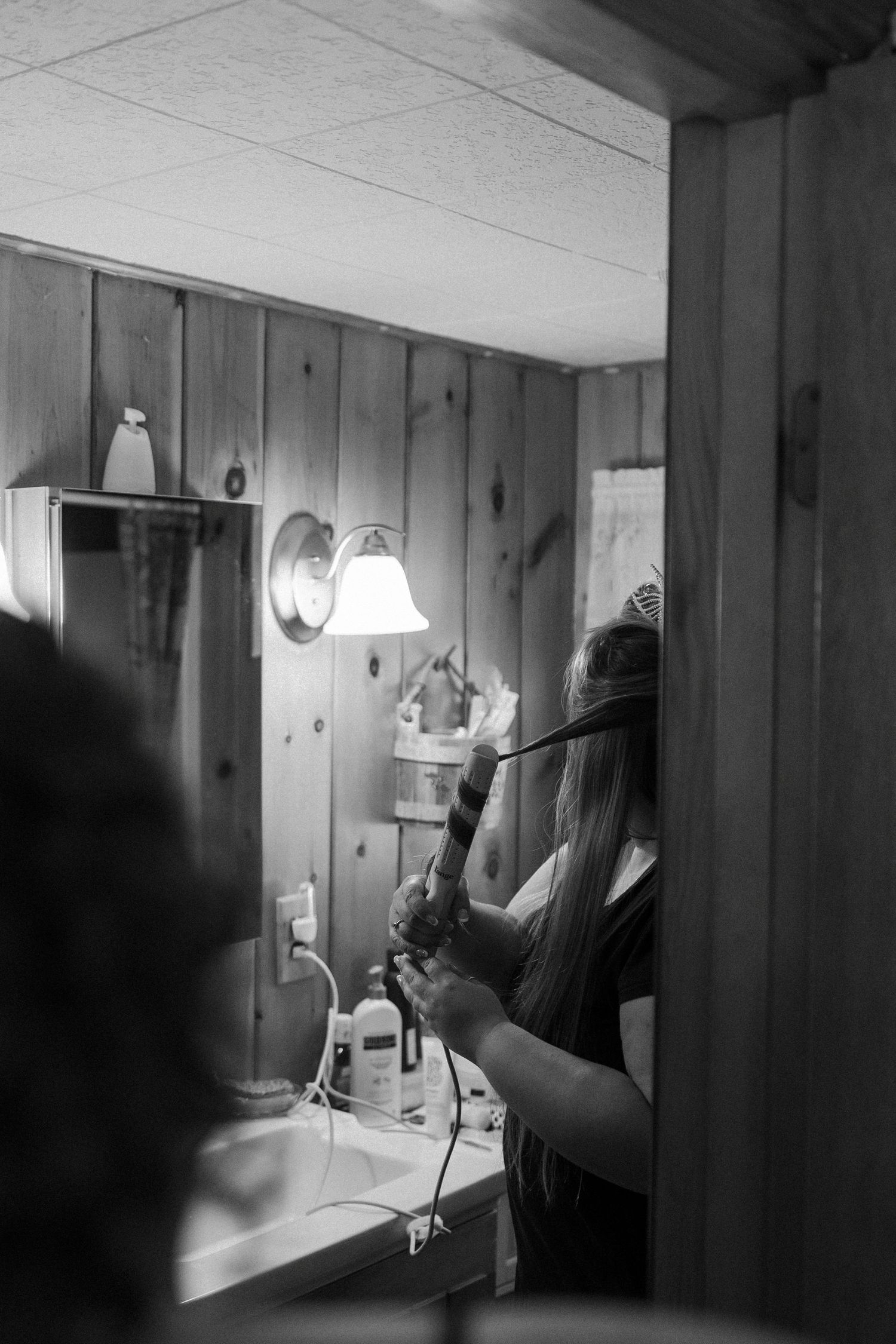 Candid photo of bride getting ready on wedding day