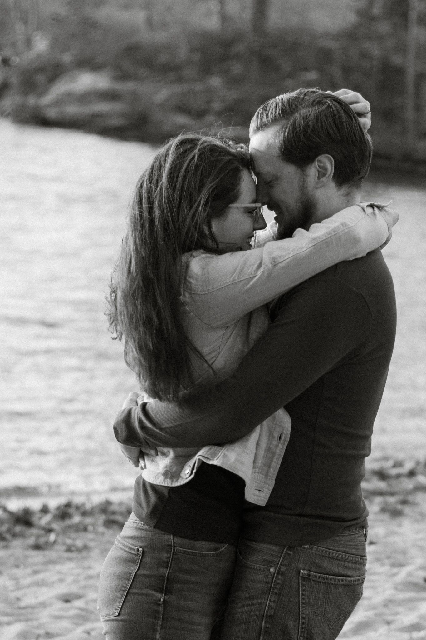 Candid photo of couple embracing