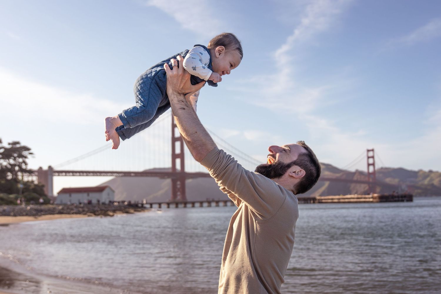 Five sequential photos showing a person jumping in front of the Golden Gate Bridge on a sunny day in San Francisco.
