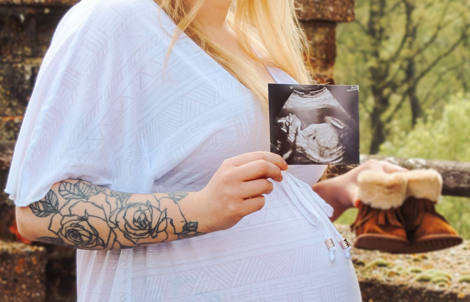 A scan photo including one of her first pair of boots to be worn on her arrival.