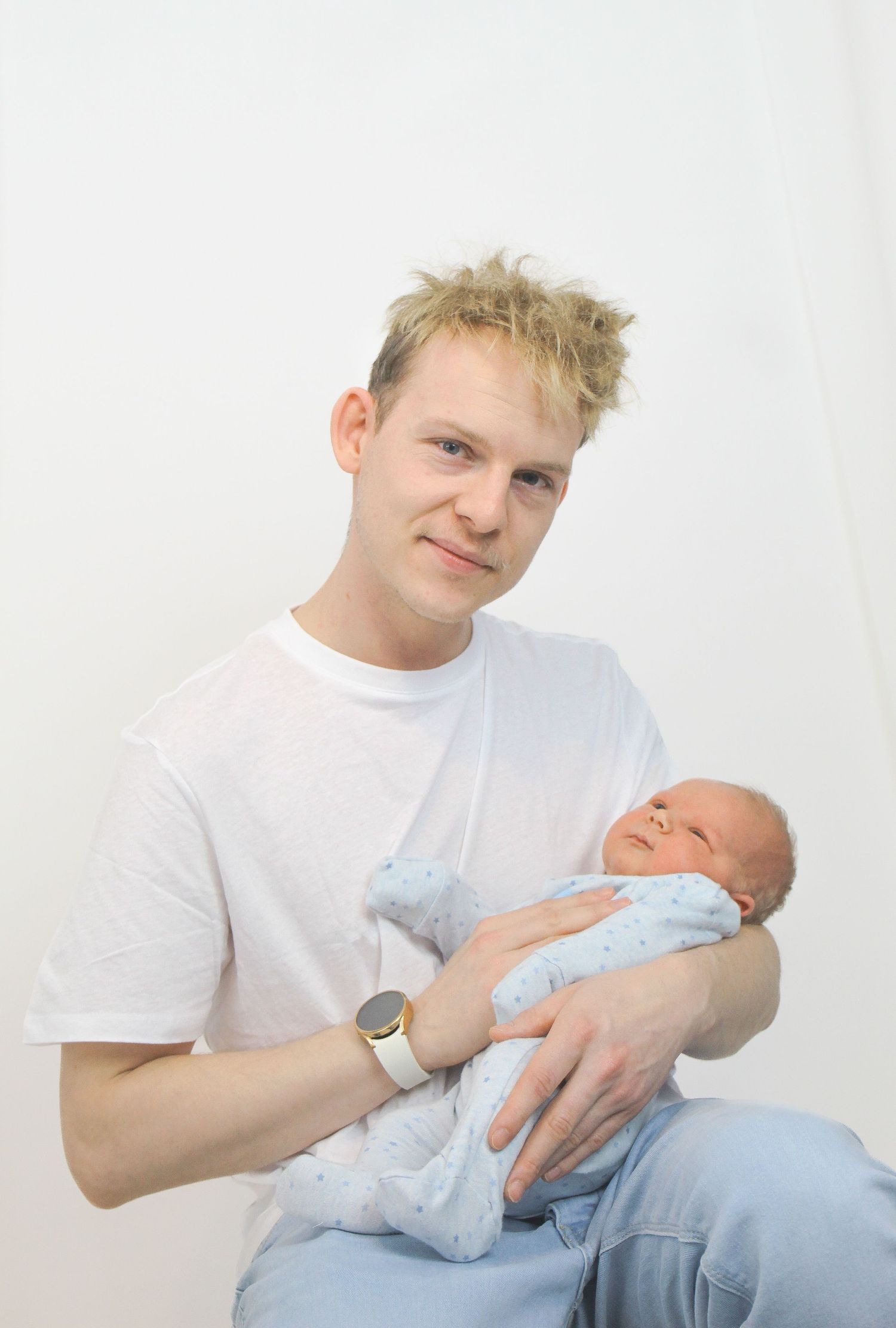 A dad with his newborn son