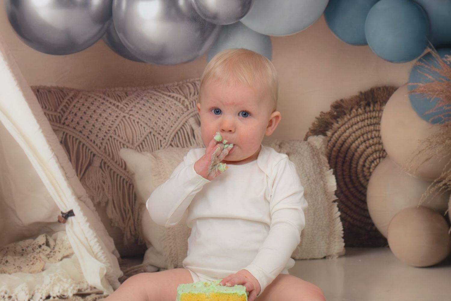 Nom, nom, nom. One cake got well and truly devoured by this little boy