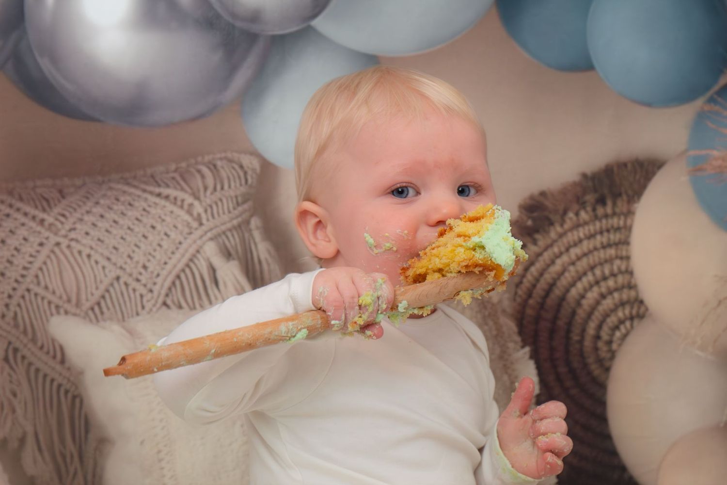 This little boy did not hang about with his cake smash.