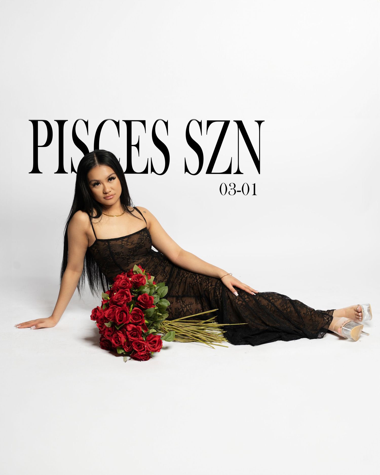 Romantic portrait with black lace gown and red roses against white background with Pisces text.