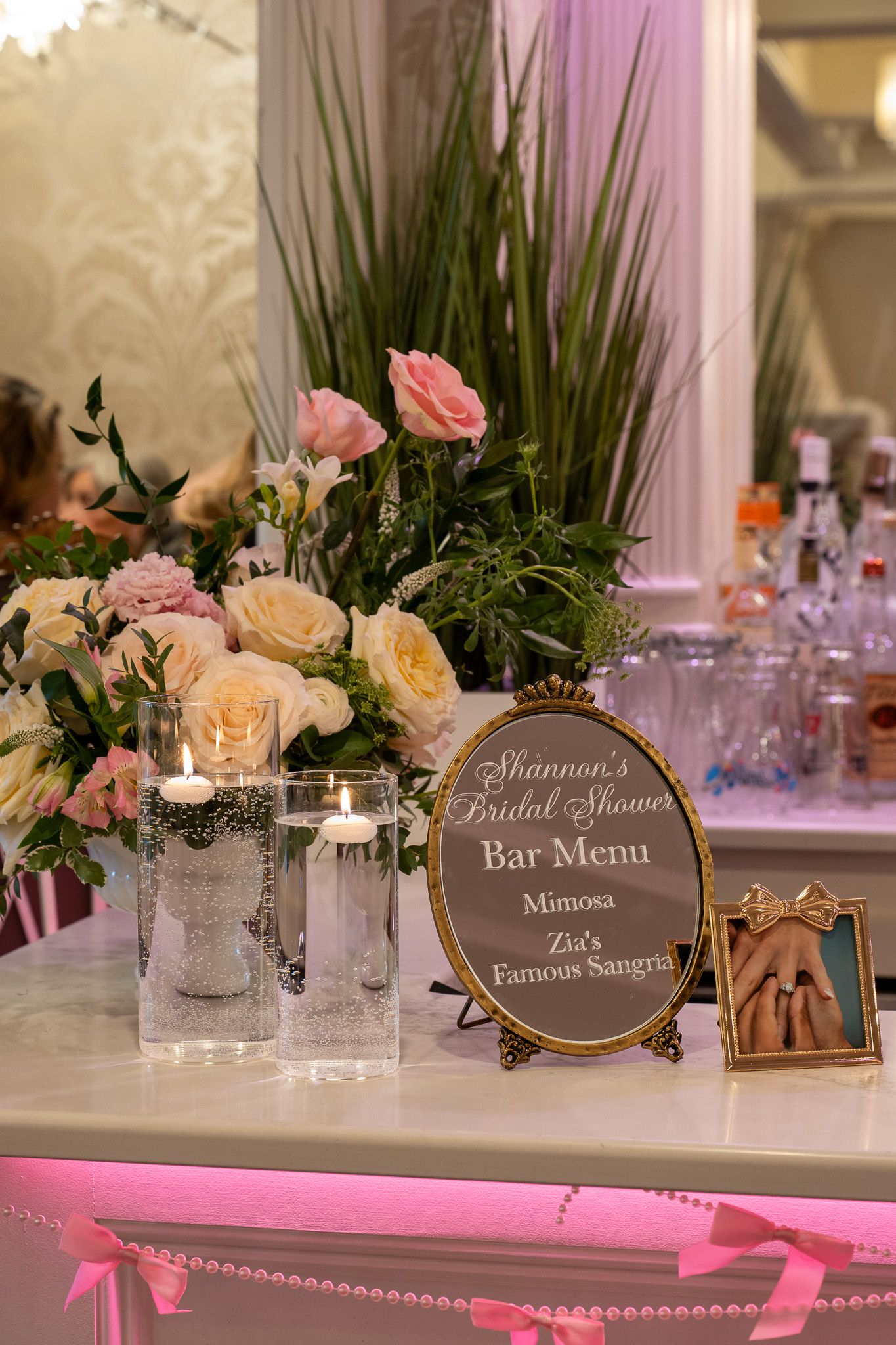 Floral centerpiece arrangement on decorated event table