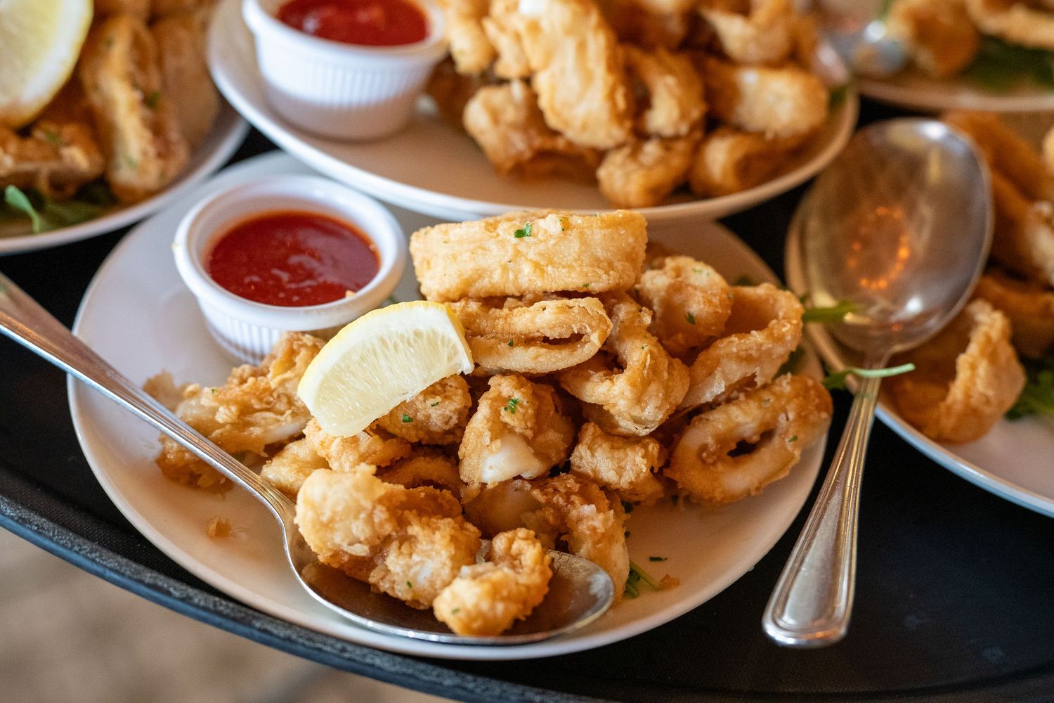 Appetizer spread with sliders and fries at celebration