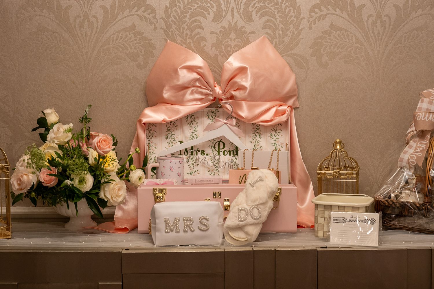 Bridal shower gift display with pink packaging