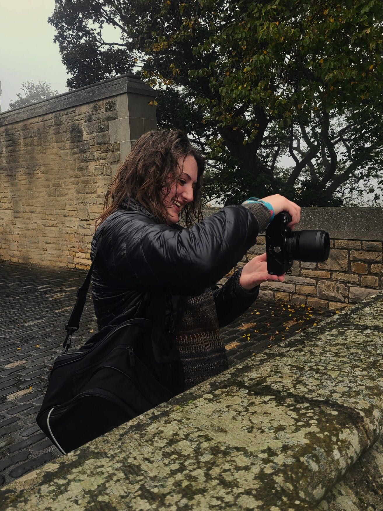 Candid picture of a photographer outdoors