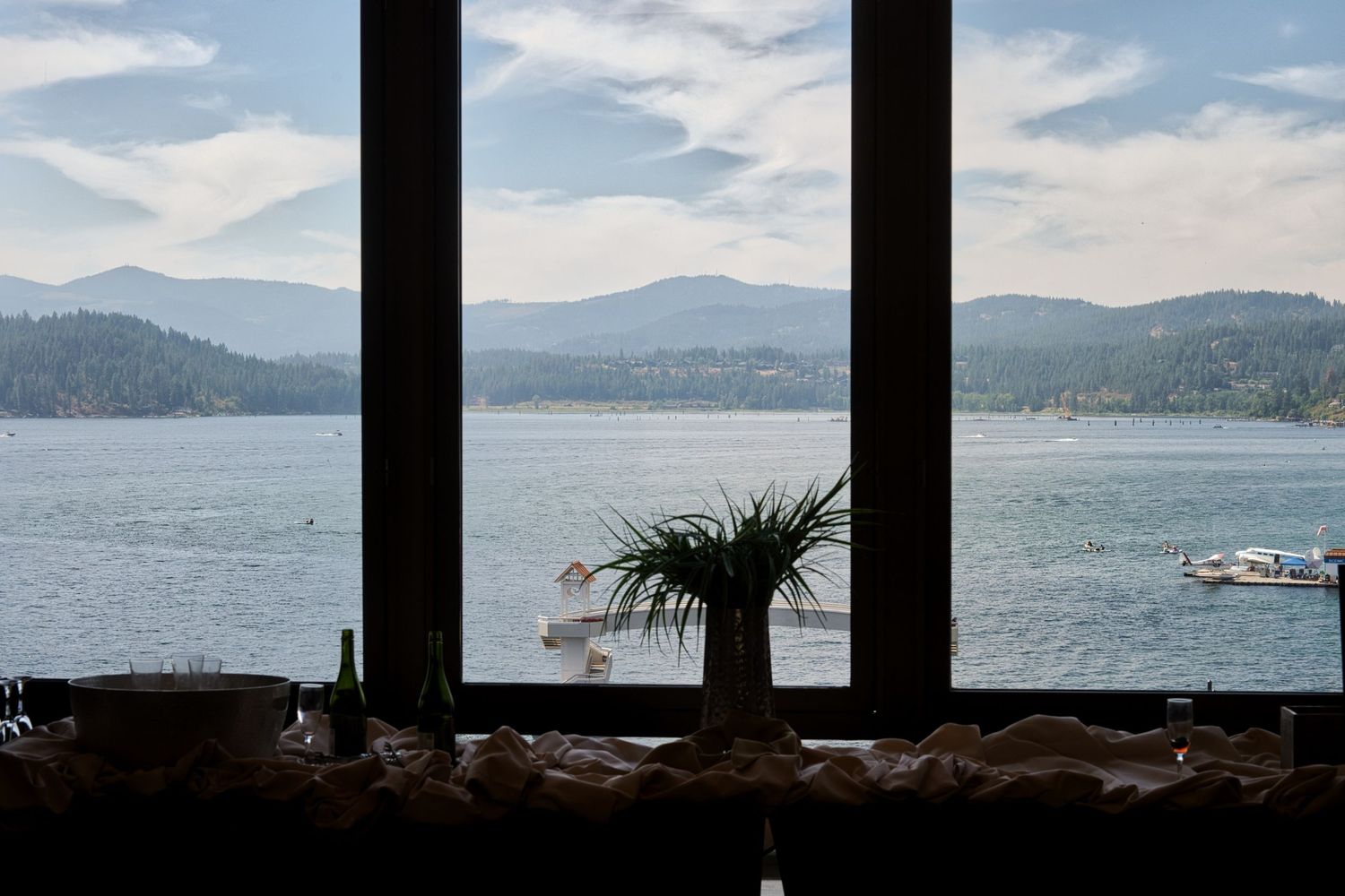 Cinematic scene setting photograph looking out of the window in the Coeur d' Alene boardroom of the girl's getting ready room.
