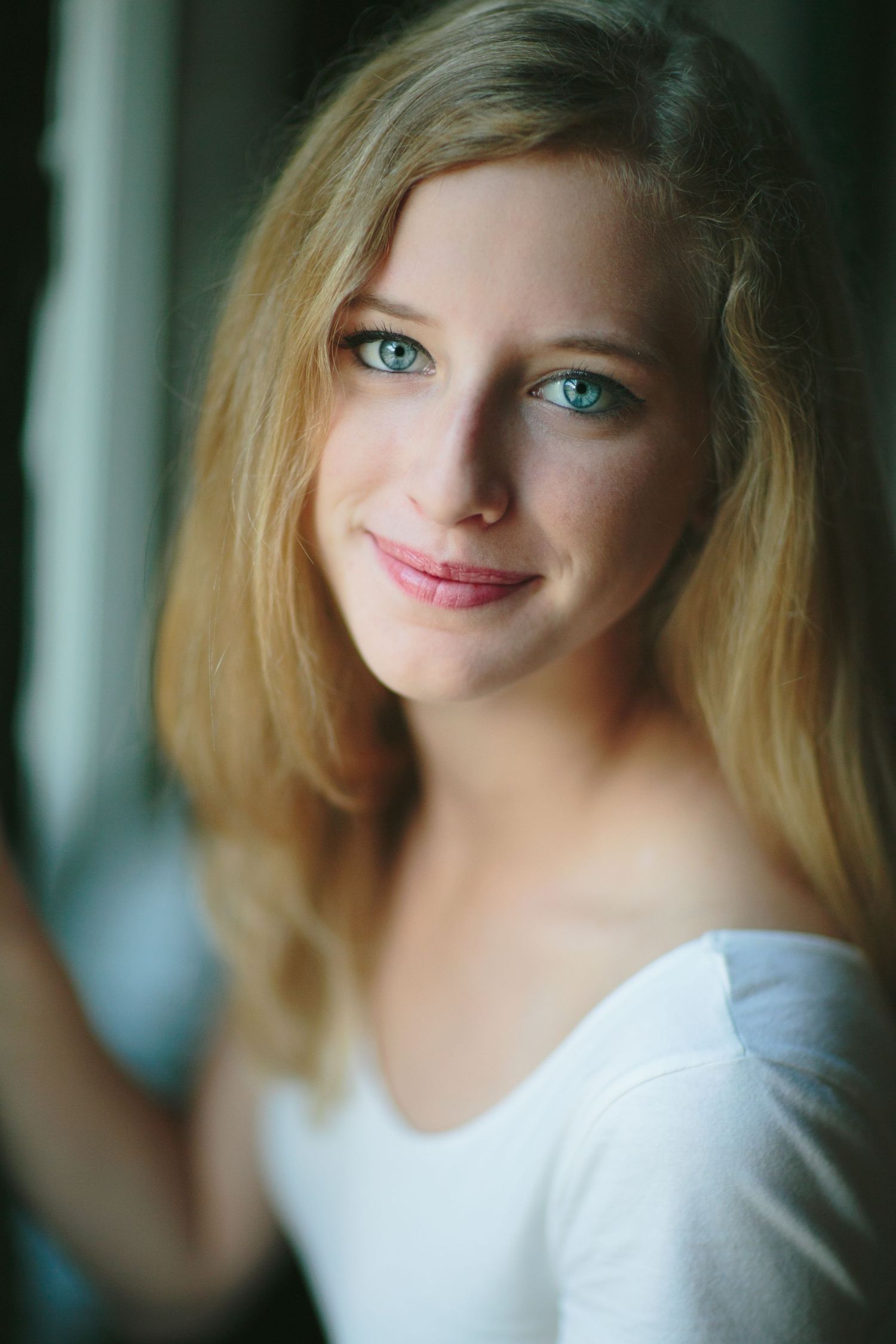 Close up portrait with soft natural window lighting.