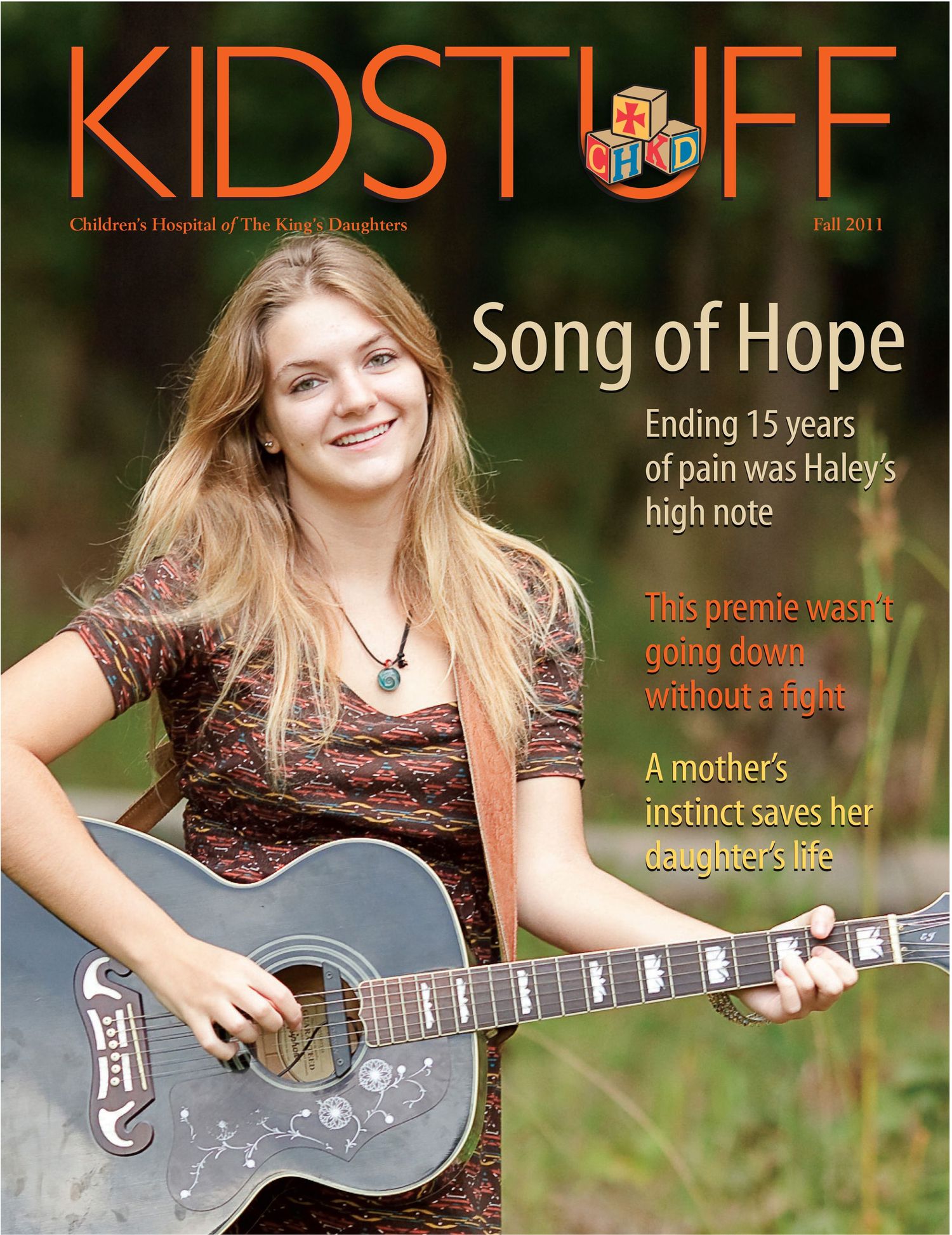Magazine cover featuring young musician with guitar and 'Song of Hope' headline.