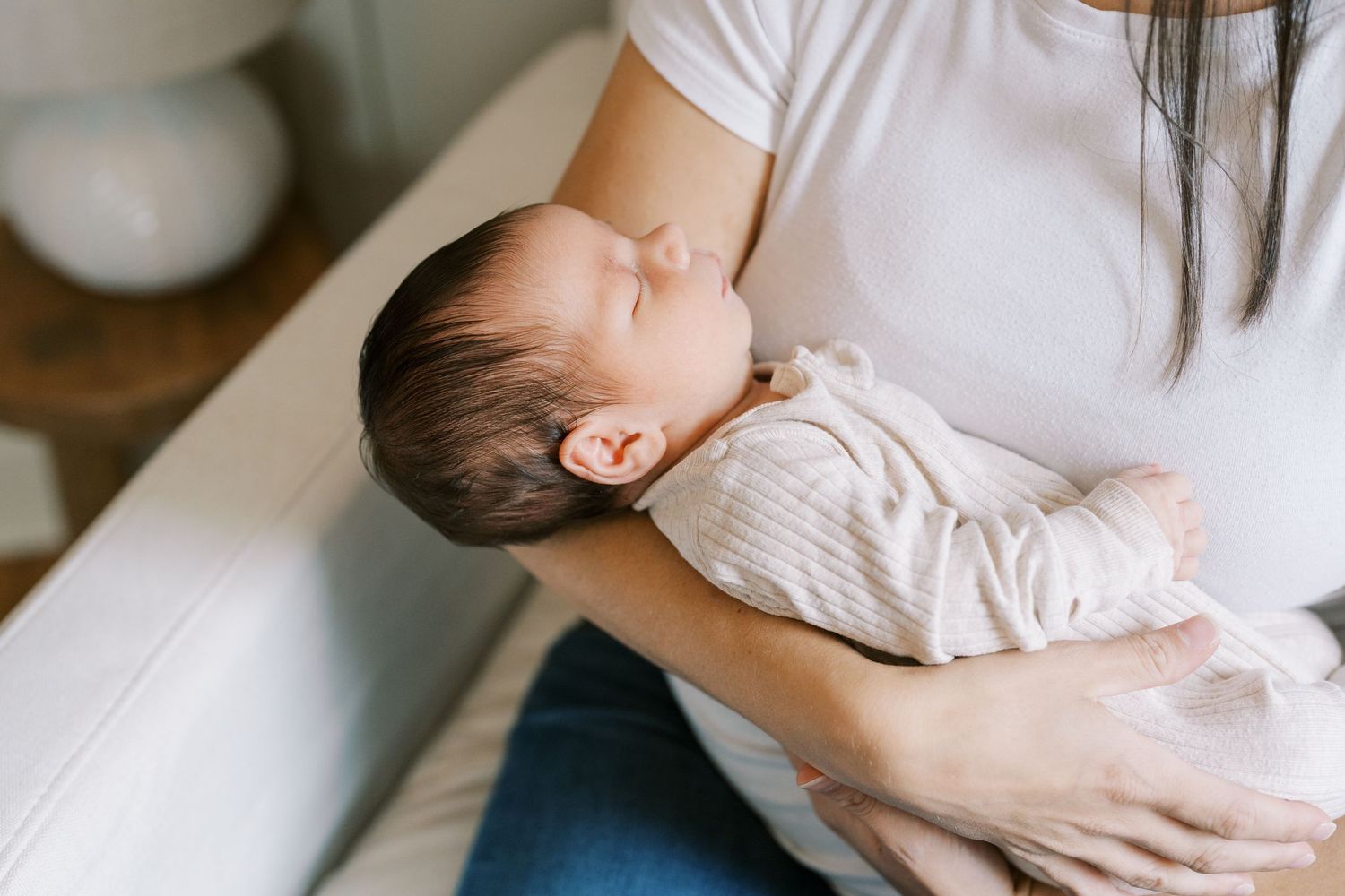 Soft, intimate lifestyle photography in bright natural light.