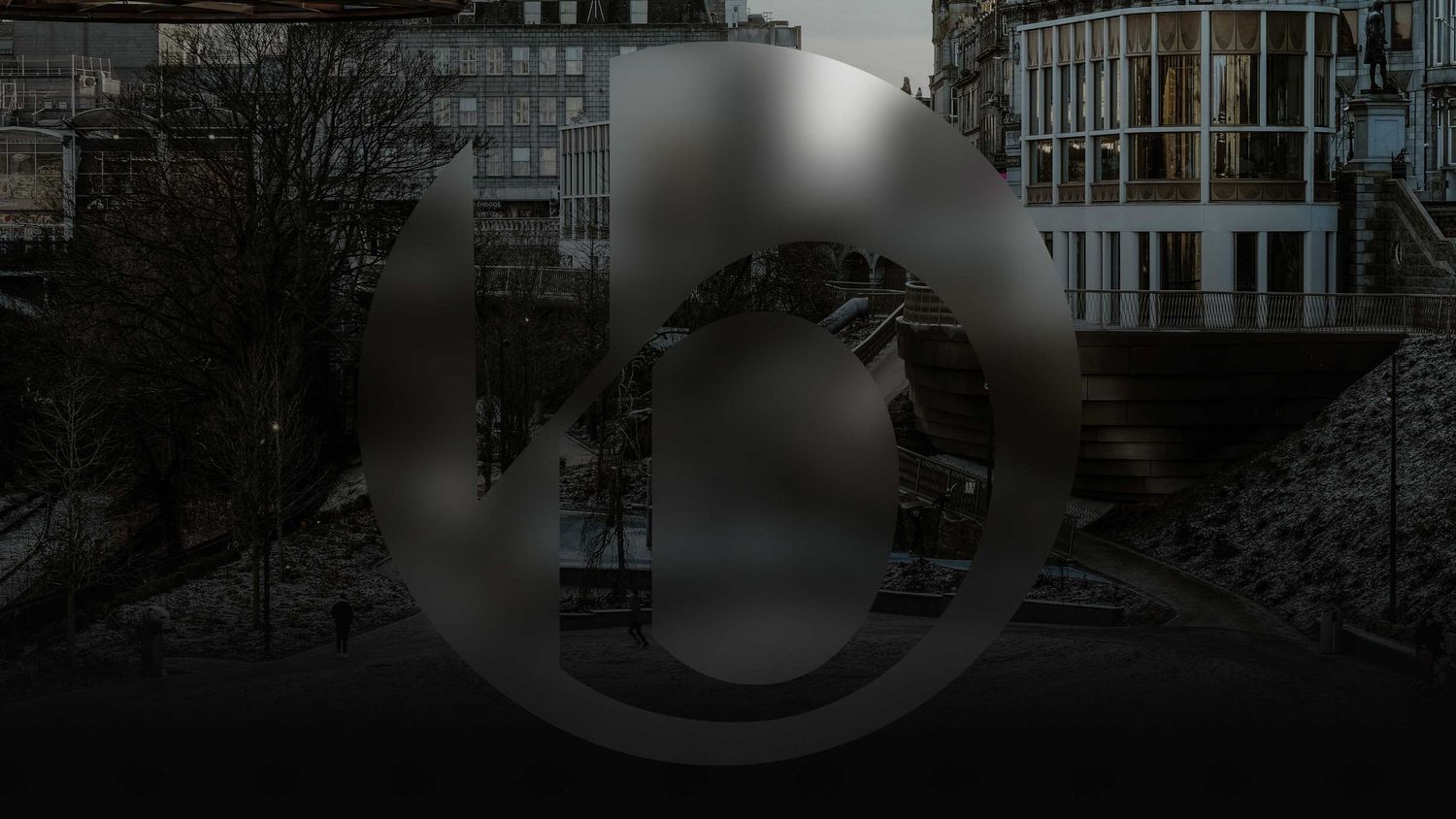 Dark moody cityscape with a large frosted number 10 overlaid on urban buildings.