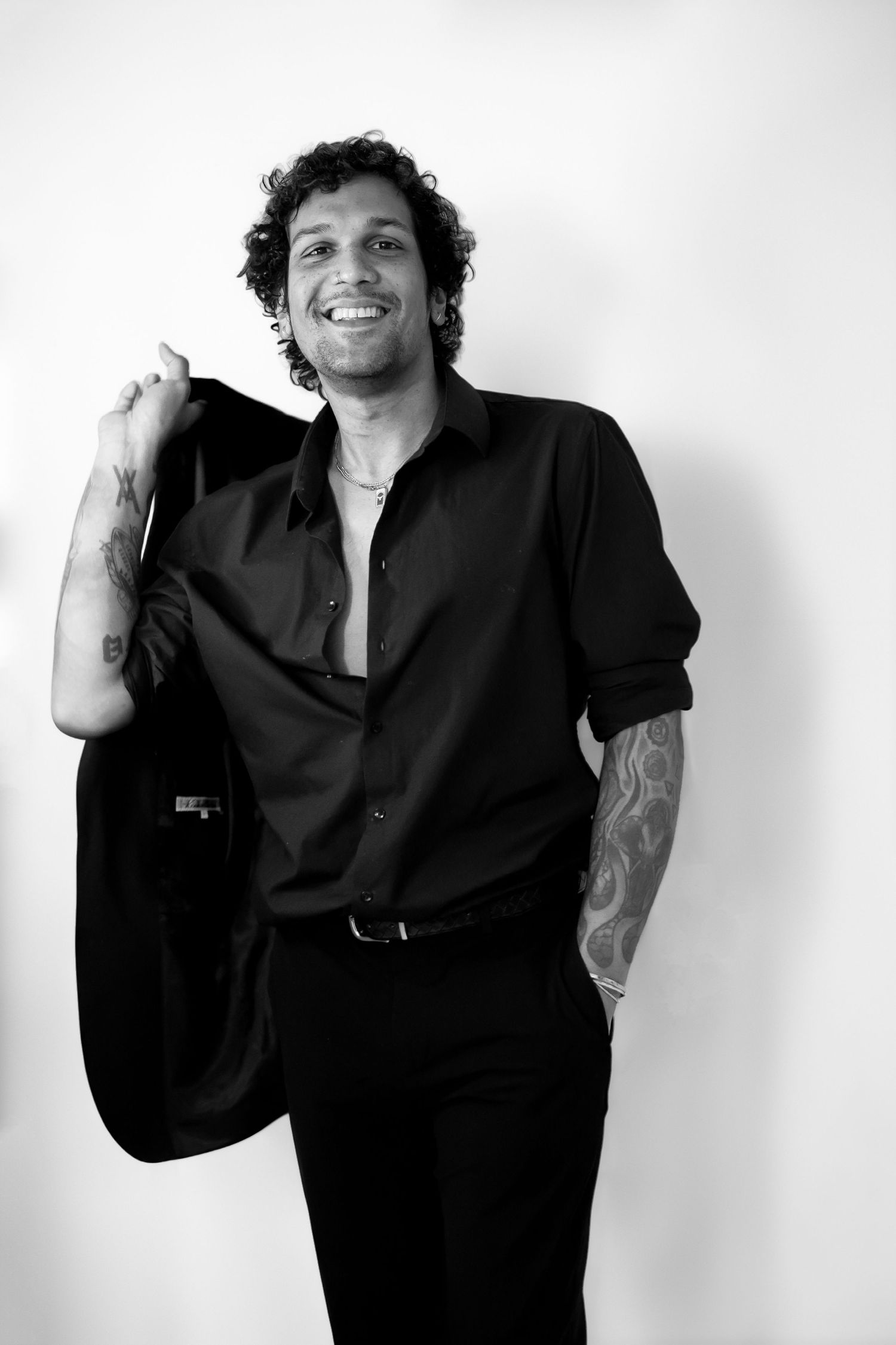 Black and white portrait series showing expressive poses against white background.