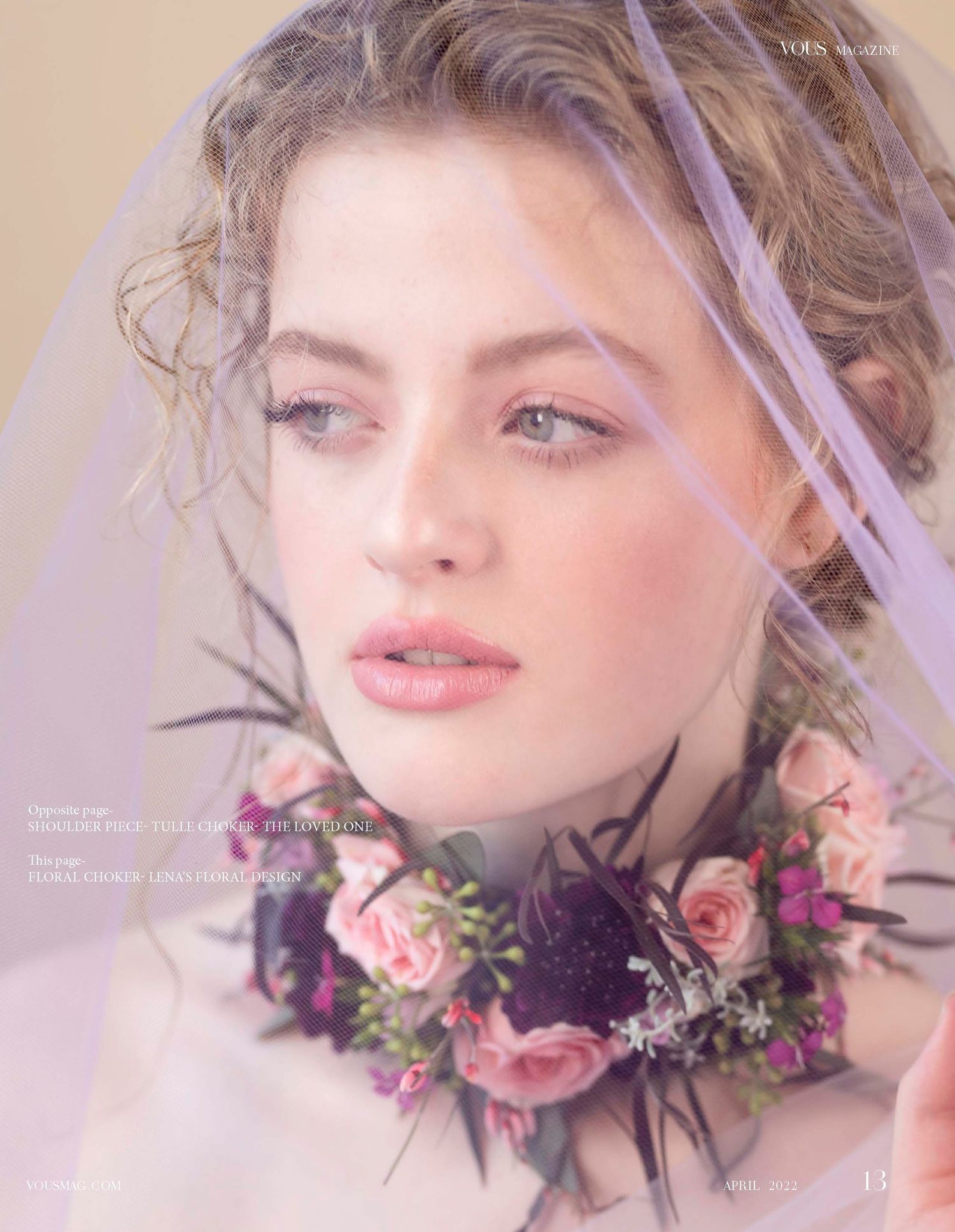 Romantic floral headpiece with pink roses and purple flowers against a soft ethereal background.