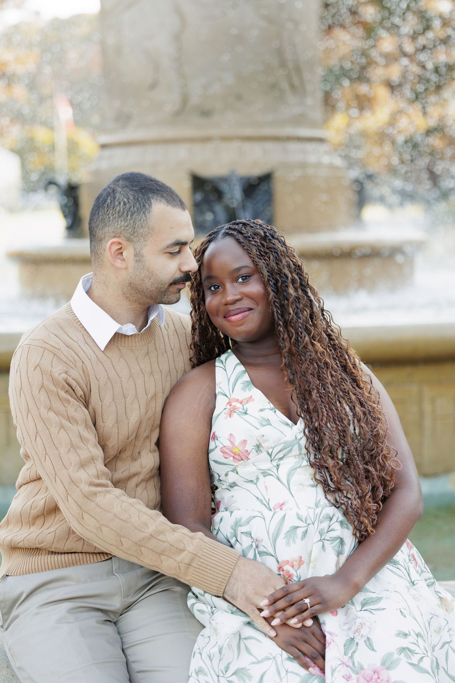 Intimate couple's portrait session showing tender moments on stone steps.