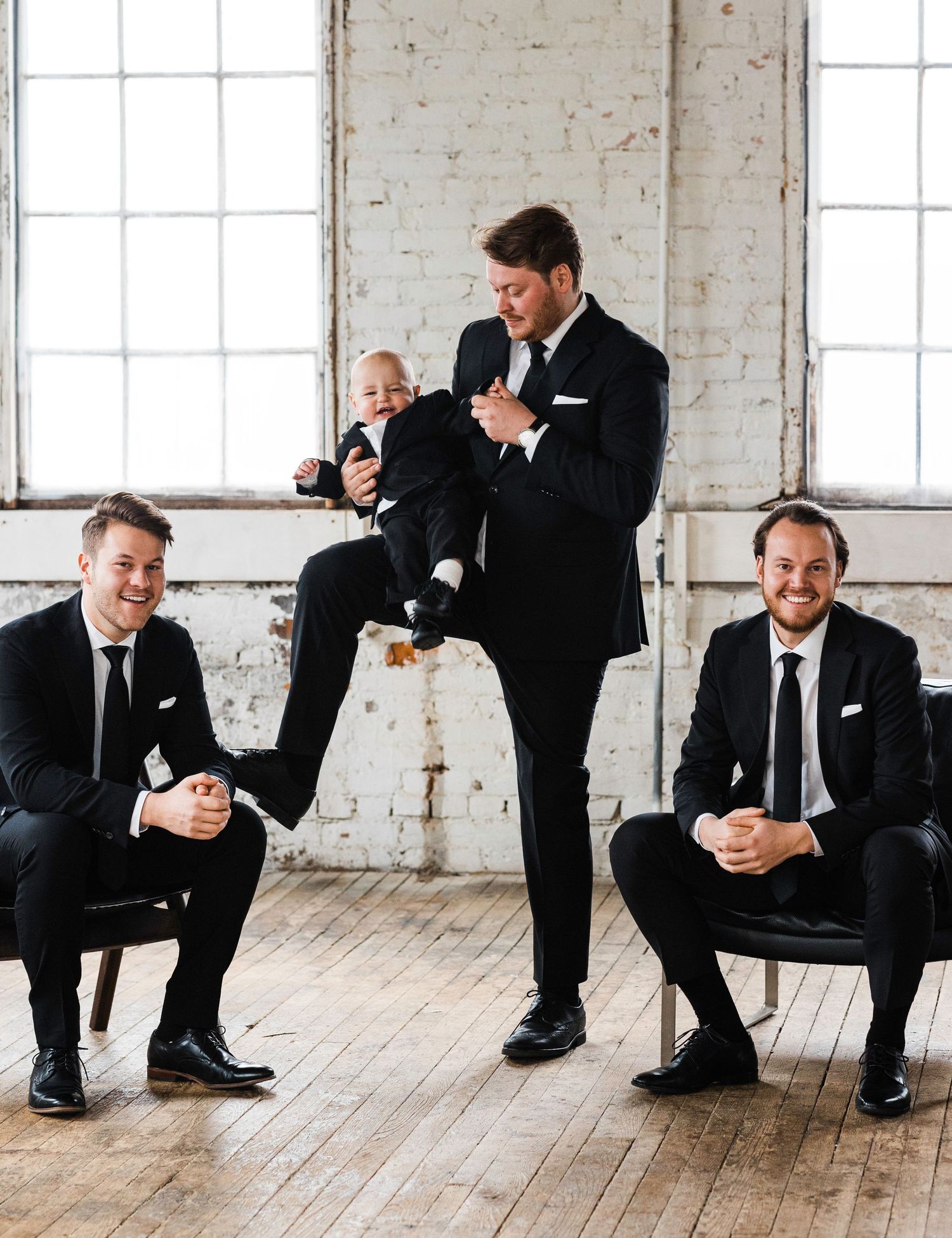 Series of candid moments showing groomsmen laughing and interacting in industrial wedding venue.