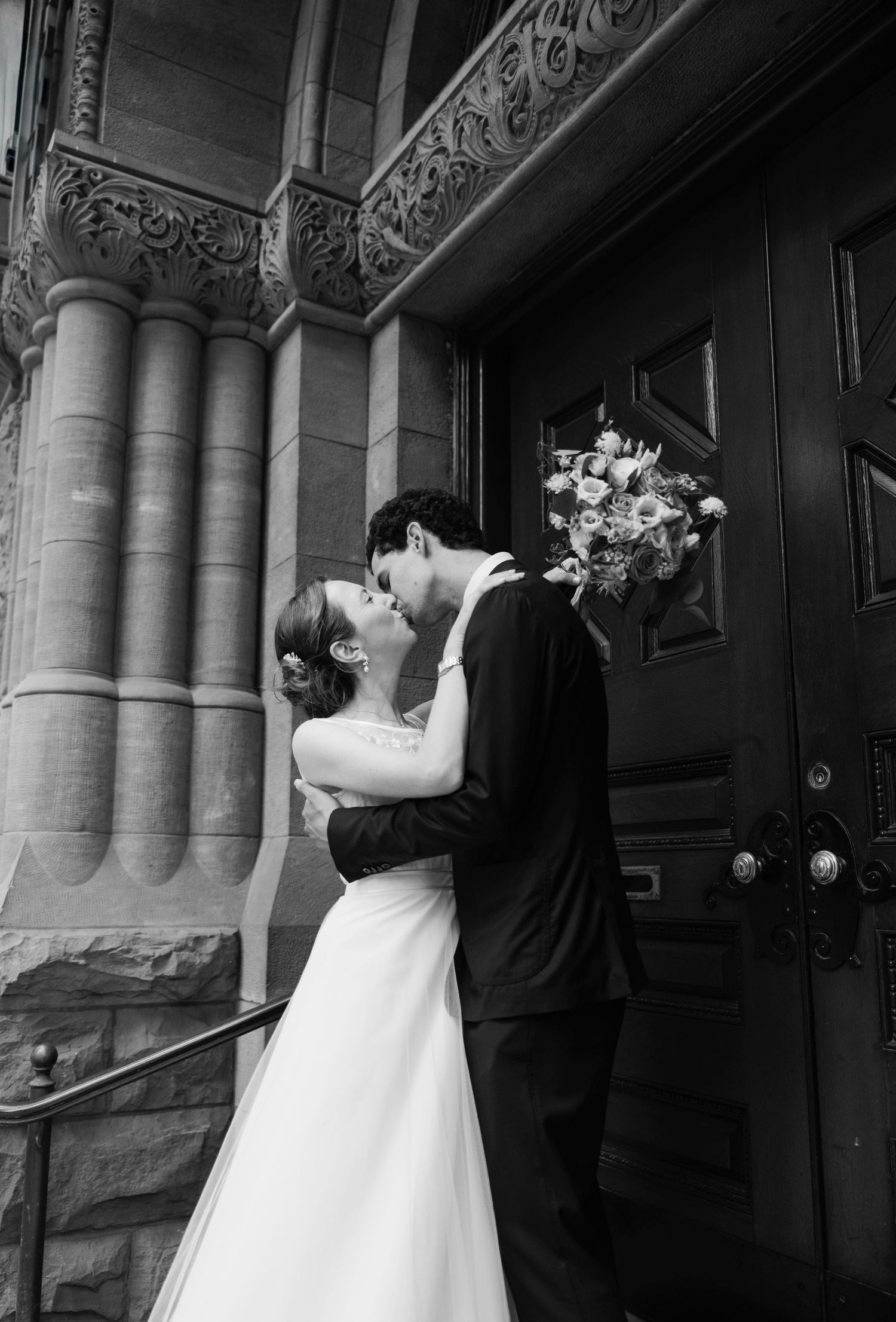 Architectural wedding photos featuring stone columns and ornate details.