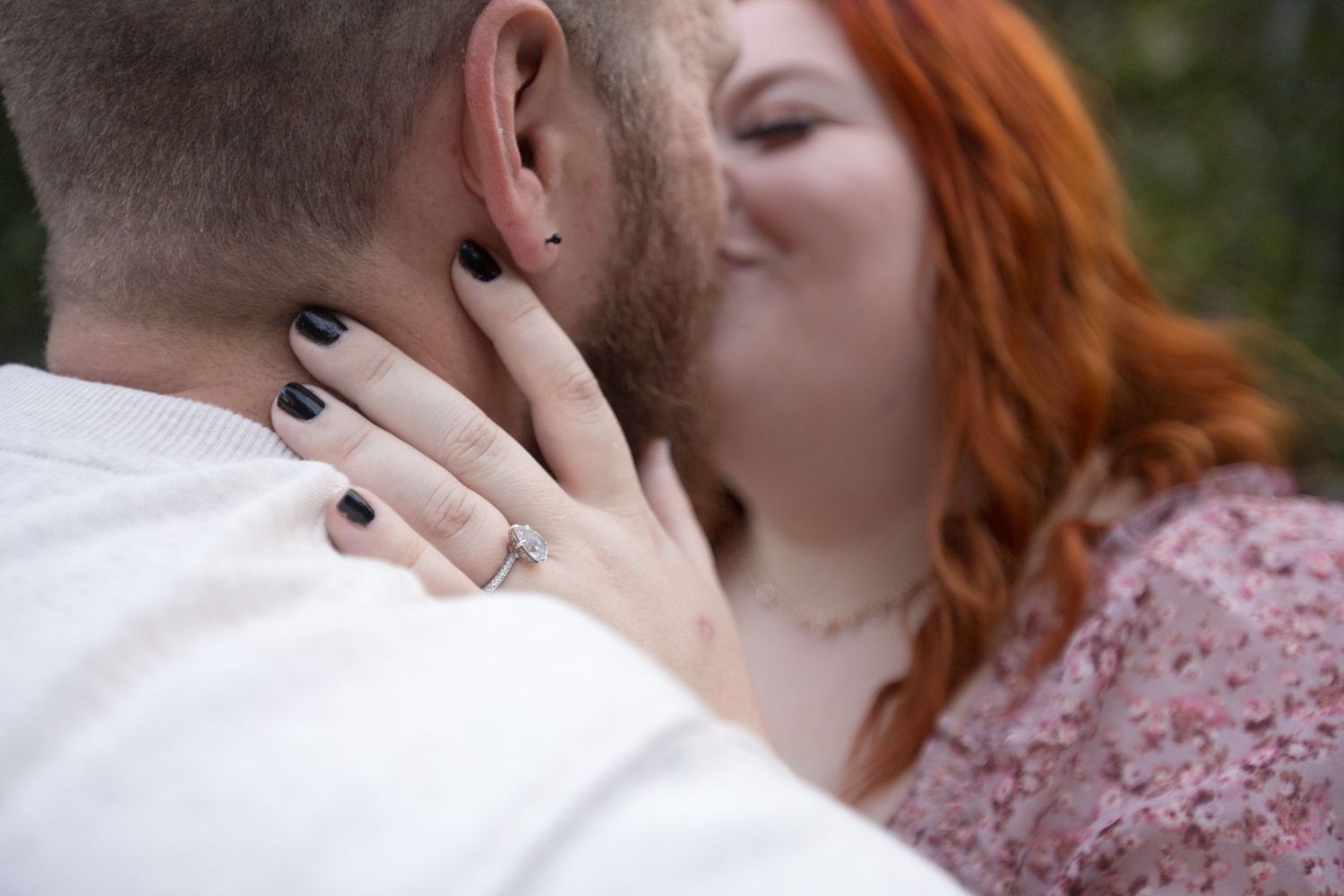 Close-up of a tender romantic moment between two people.