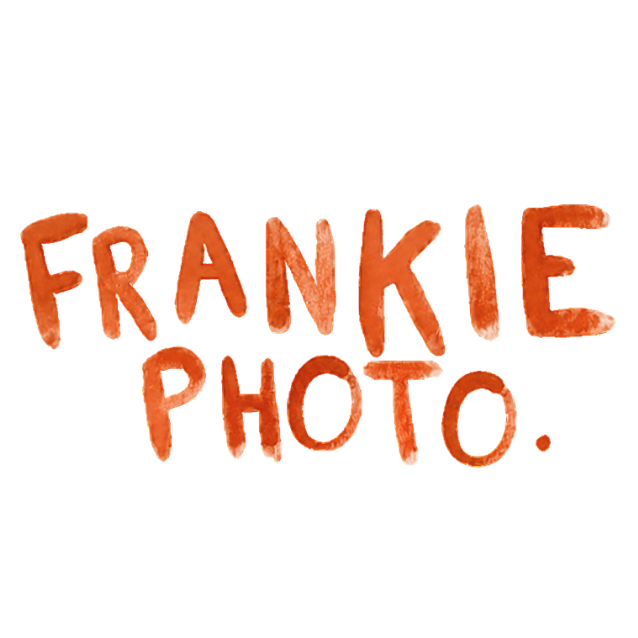 Frankie Photo logo in hand-painted orange watercolor brush lettering on white background.