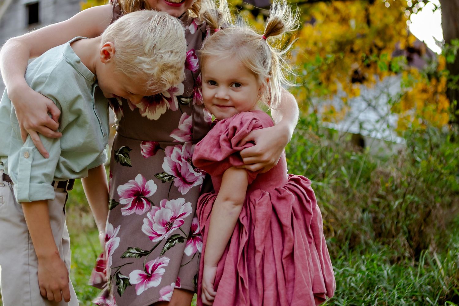 Siblings hug during fall photo session in Oconomowoc