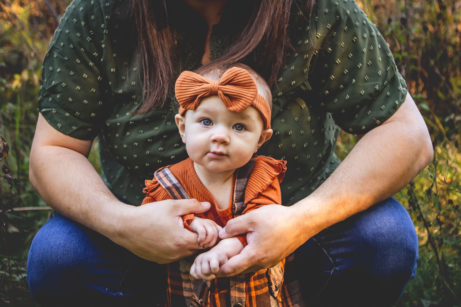Close-up detail shots of family members interacting in casual outdoor setting.