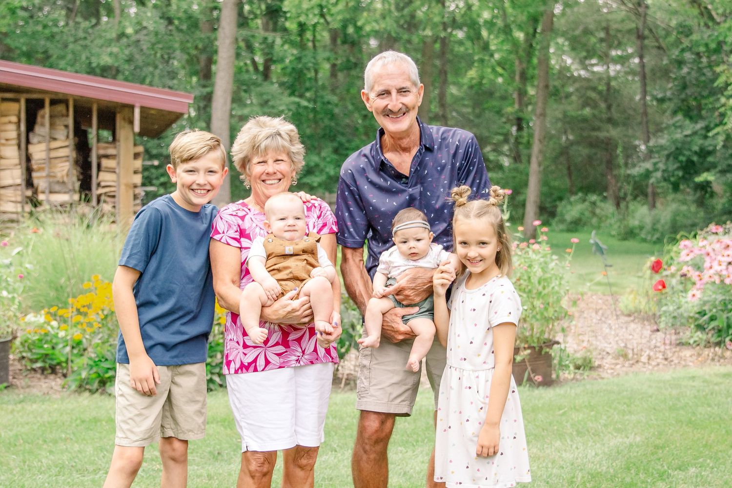 A series of outdoor family photos arranged in a horizontal collage showing people enjoying time together in nature at Delafield home session