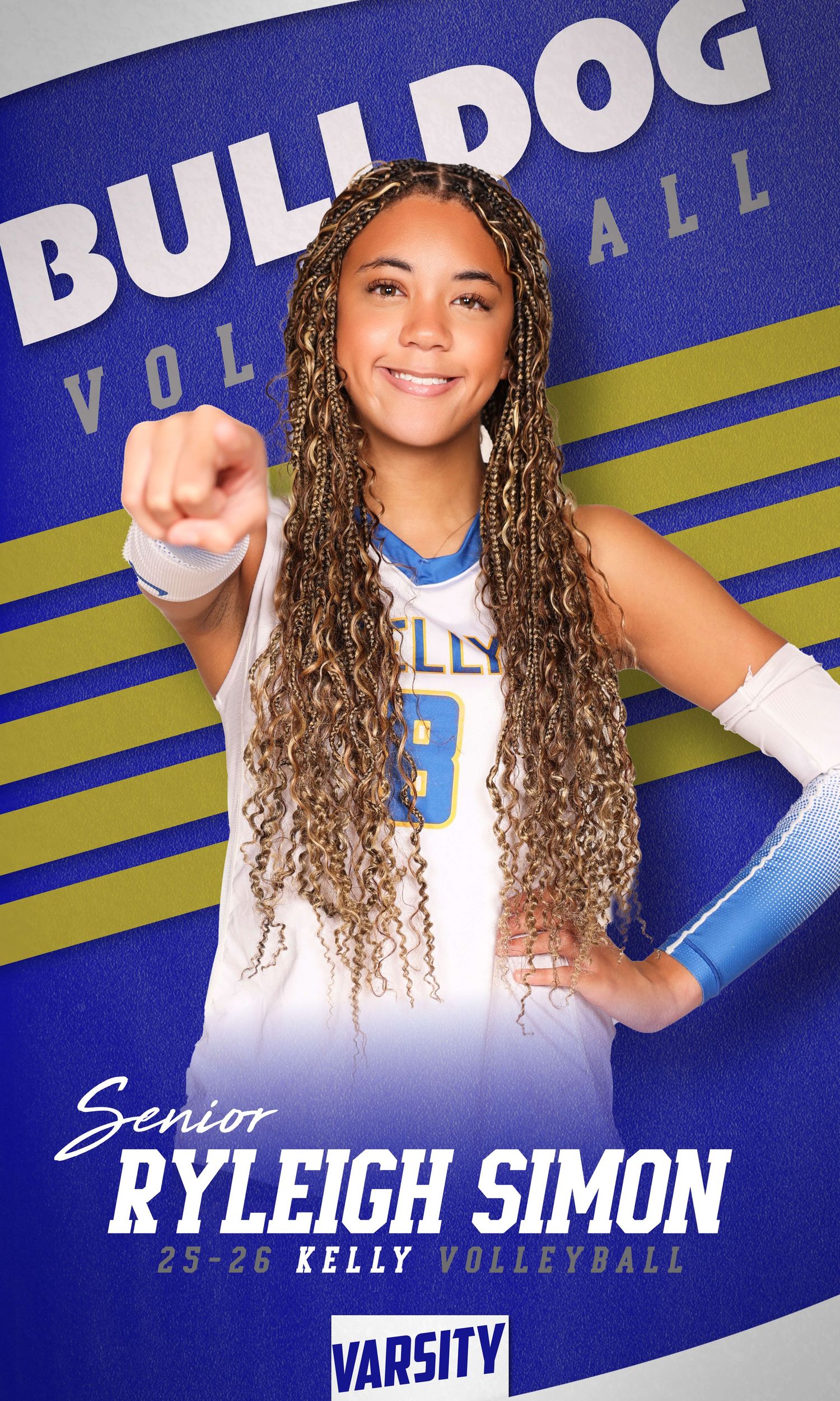 Volleyball player in white uniform poses against blue Bulldog backdrop for senior sports photo.