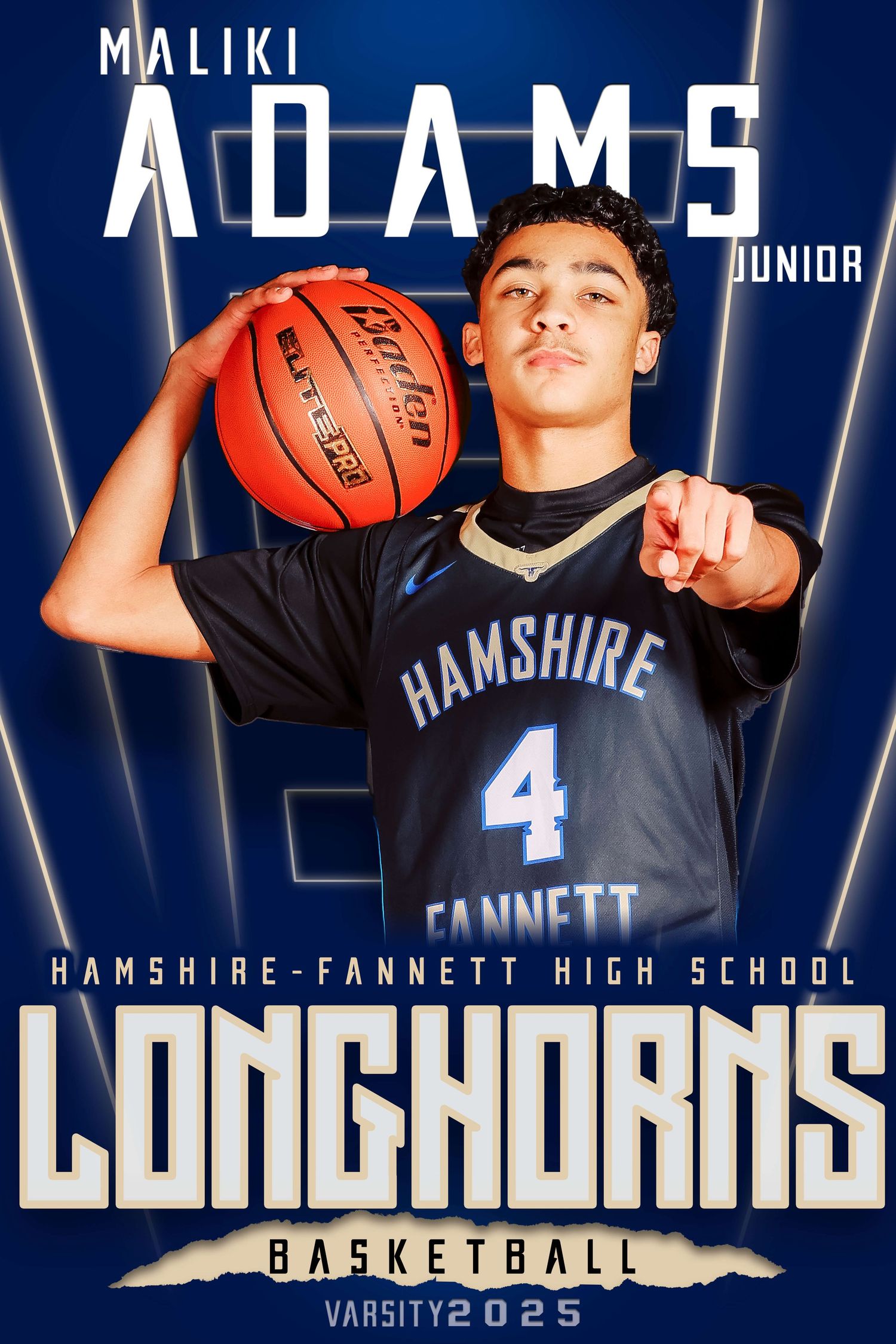 High school basketball player in navy Hamshire jersey number 4 poses with basketball against blue background for team photo.