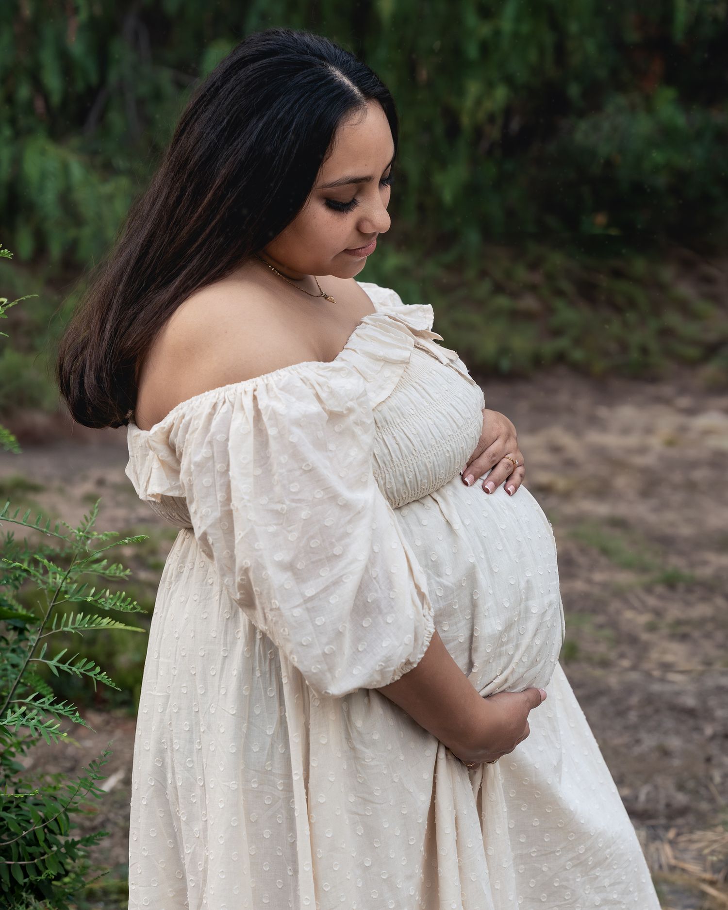 A series of intimate outdoor portraits showing tender embraces against a natural green backdrop.