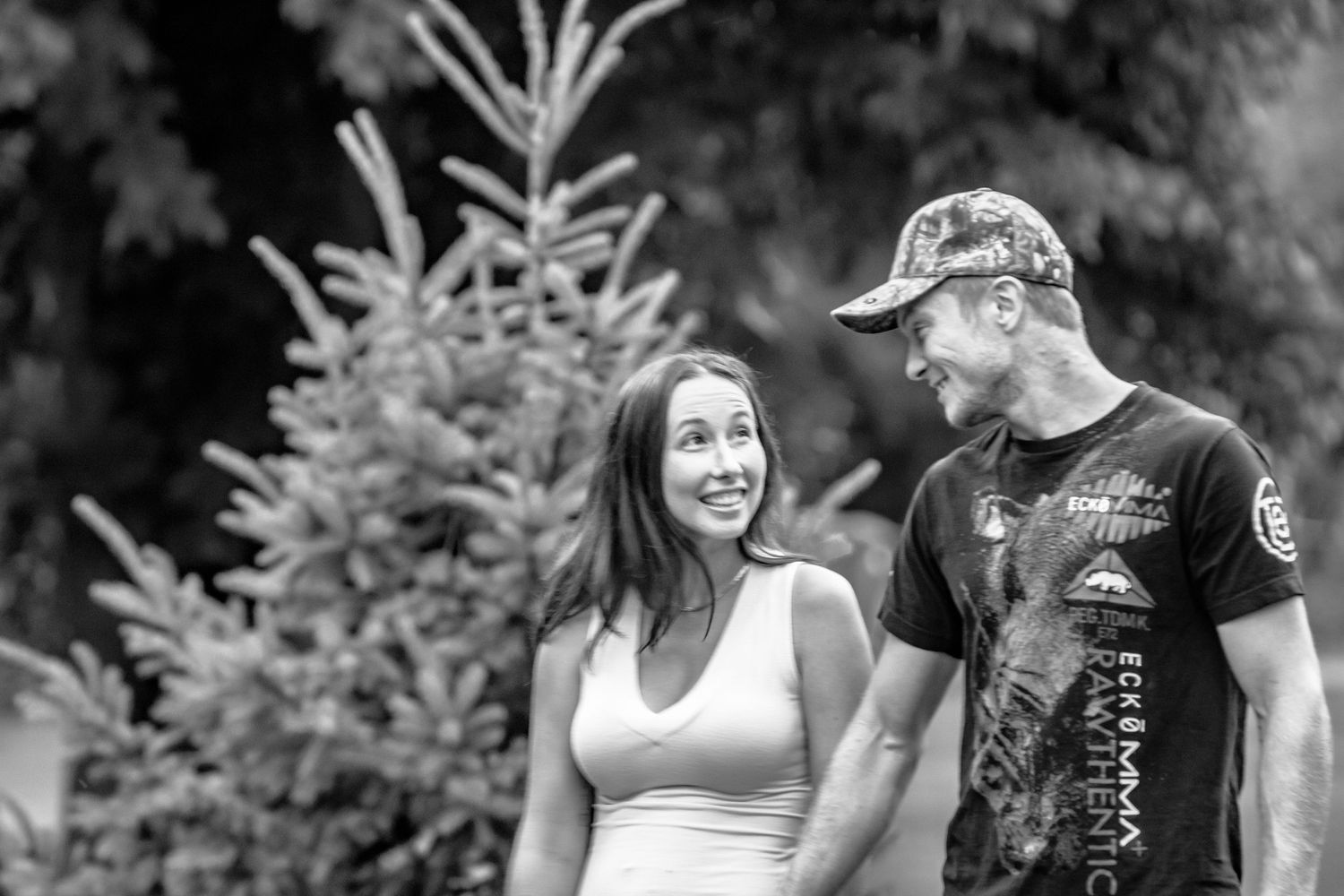 Casual outdoor couple photoshoot in natural lighting.